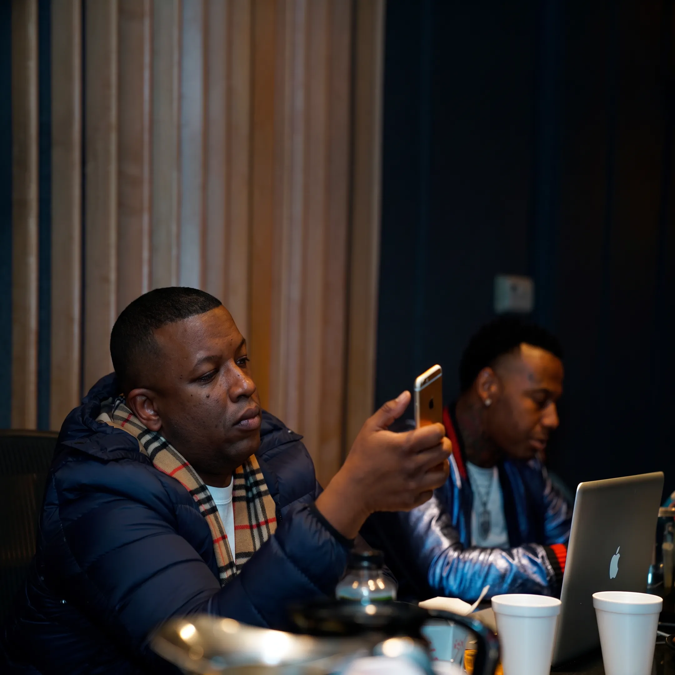 Artist discussing a music marketing campaign with a consultant
