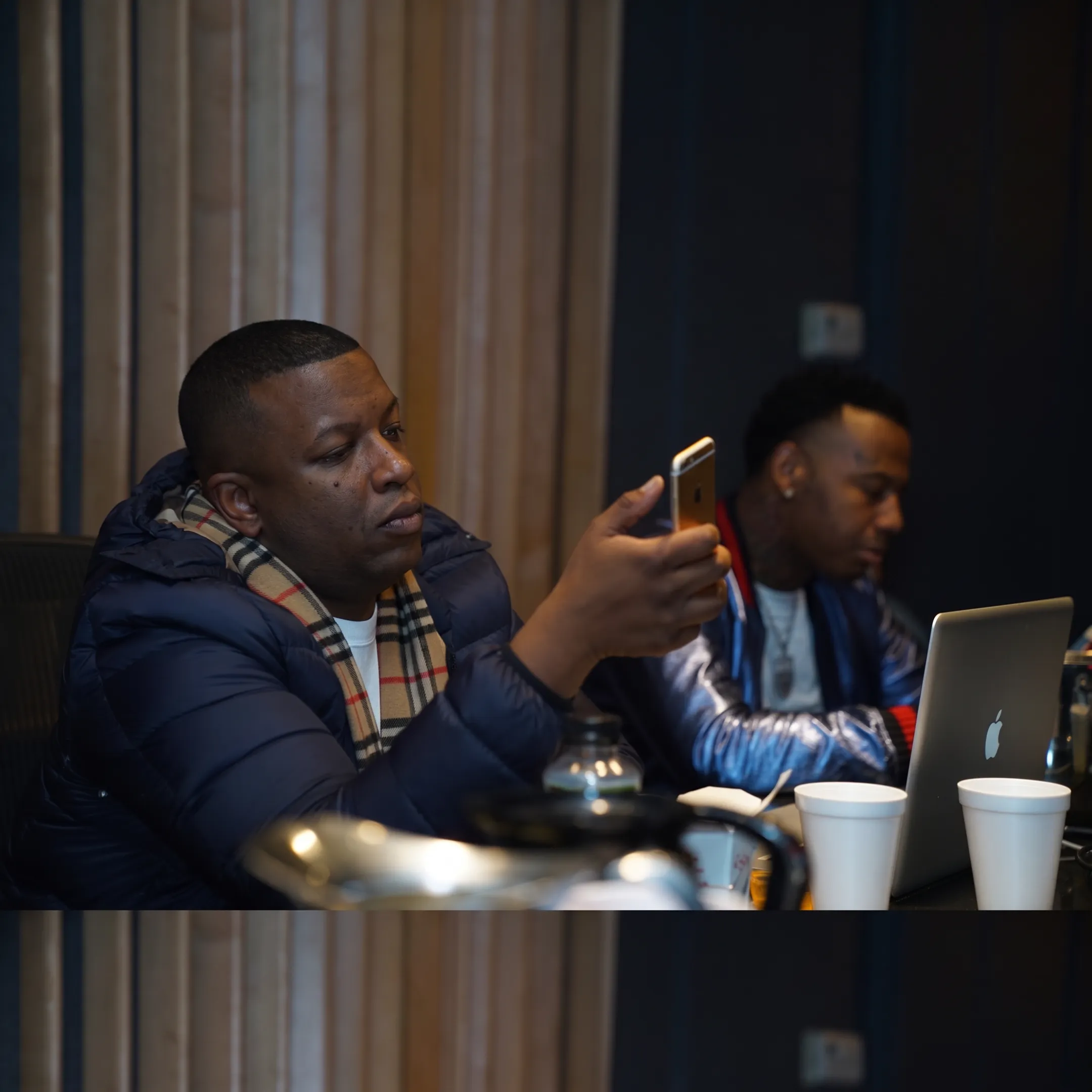 Music manager planning an artist campaign with promotional materials