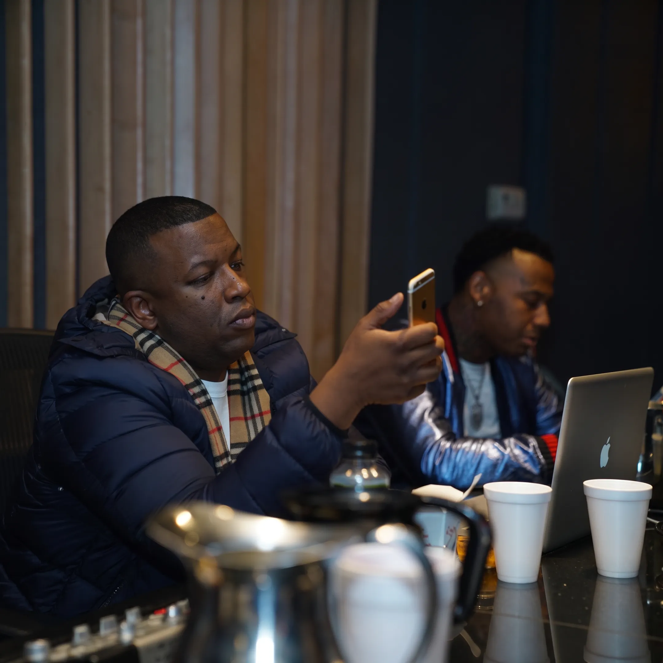 Artist manager discussing career strategy with a musician in a New Orleans studio