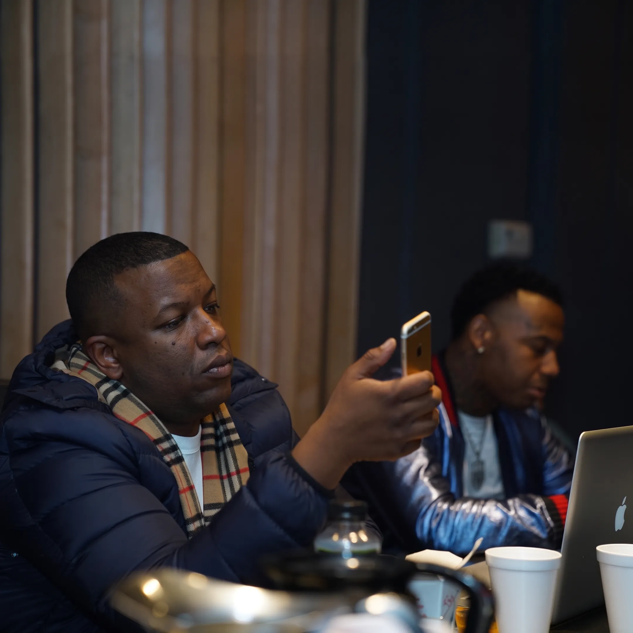 Music PR team planning an artist publicity campaign with media materials and release strategy documents