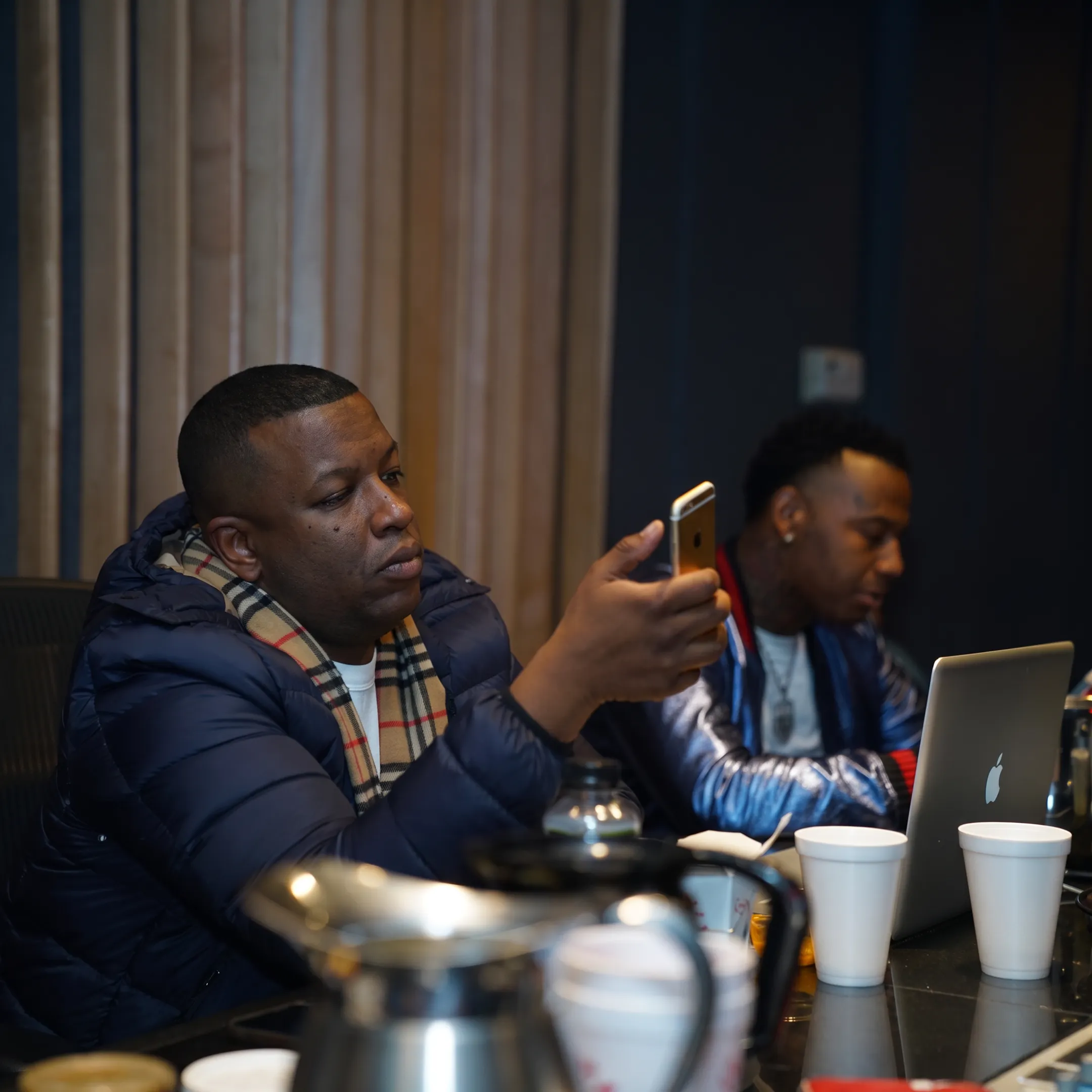 Artist meeting with entertainment consultant in a music studio