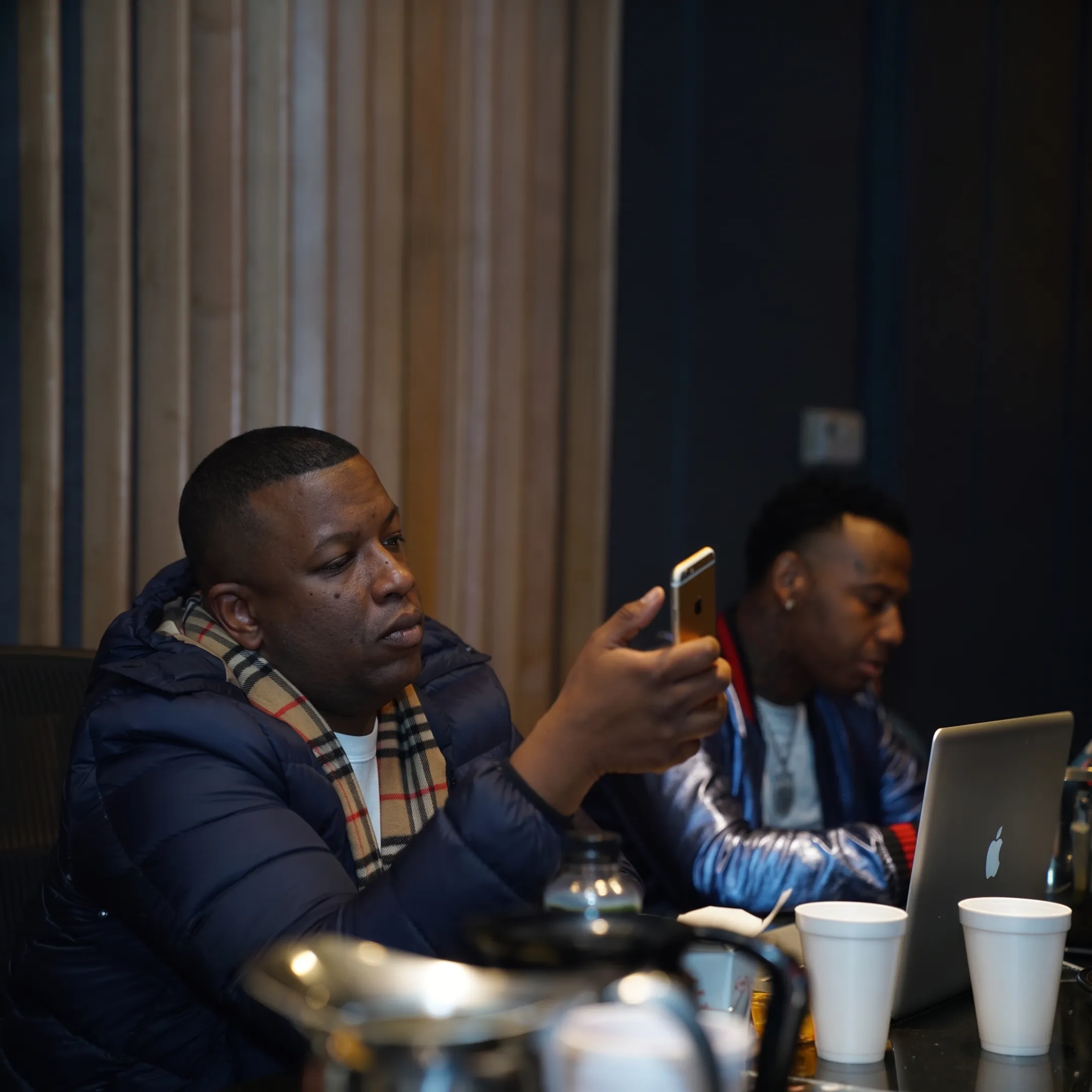 Entertainment consultant reviewing an artist campaign with a client