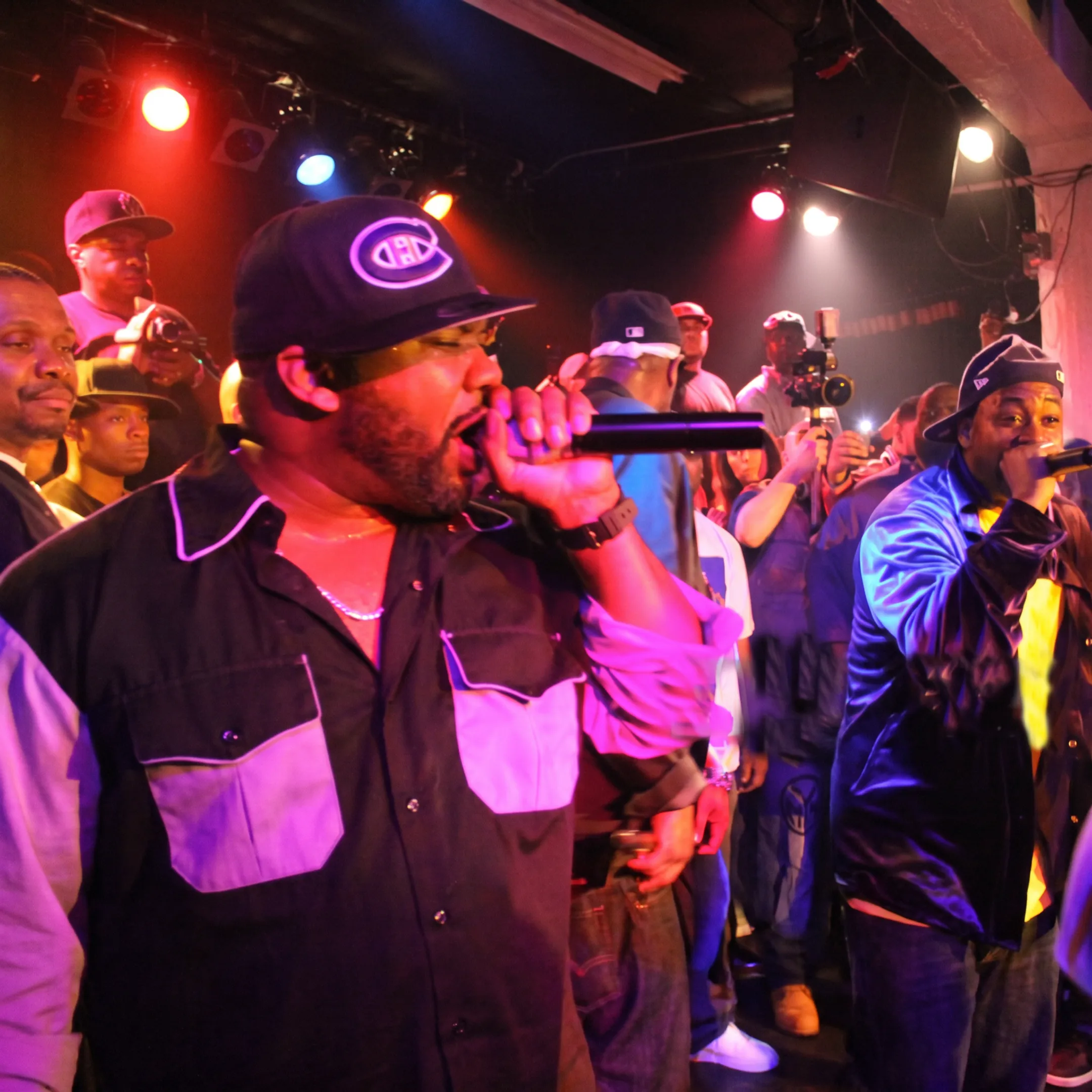 Emerging artist performing onstage before an engaged live audience