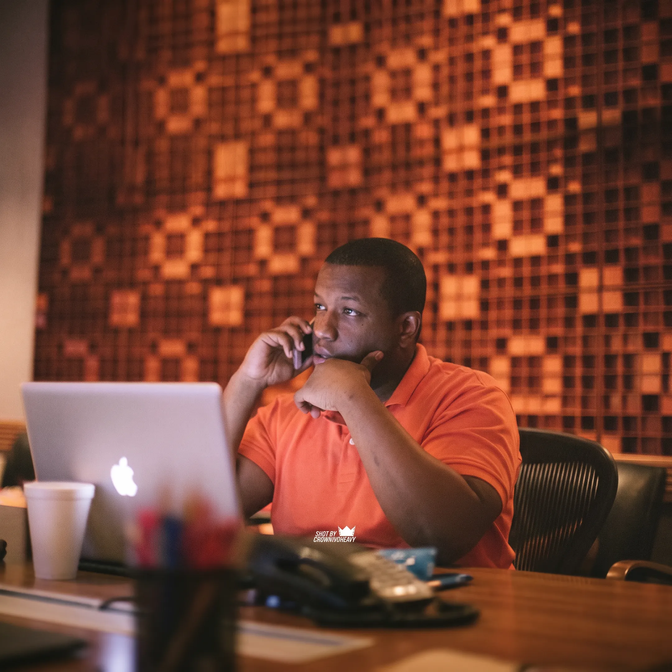 Booking professional reviewing live performance plans with an emerging artist
