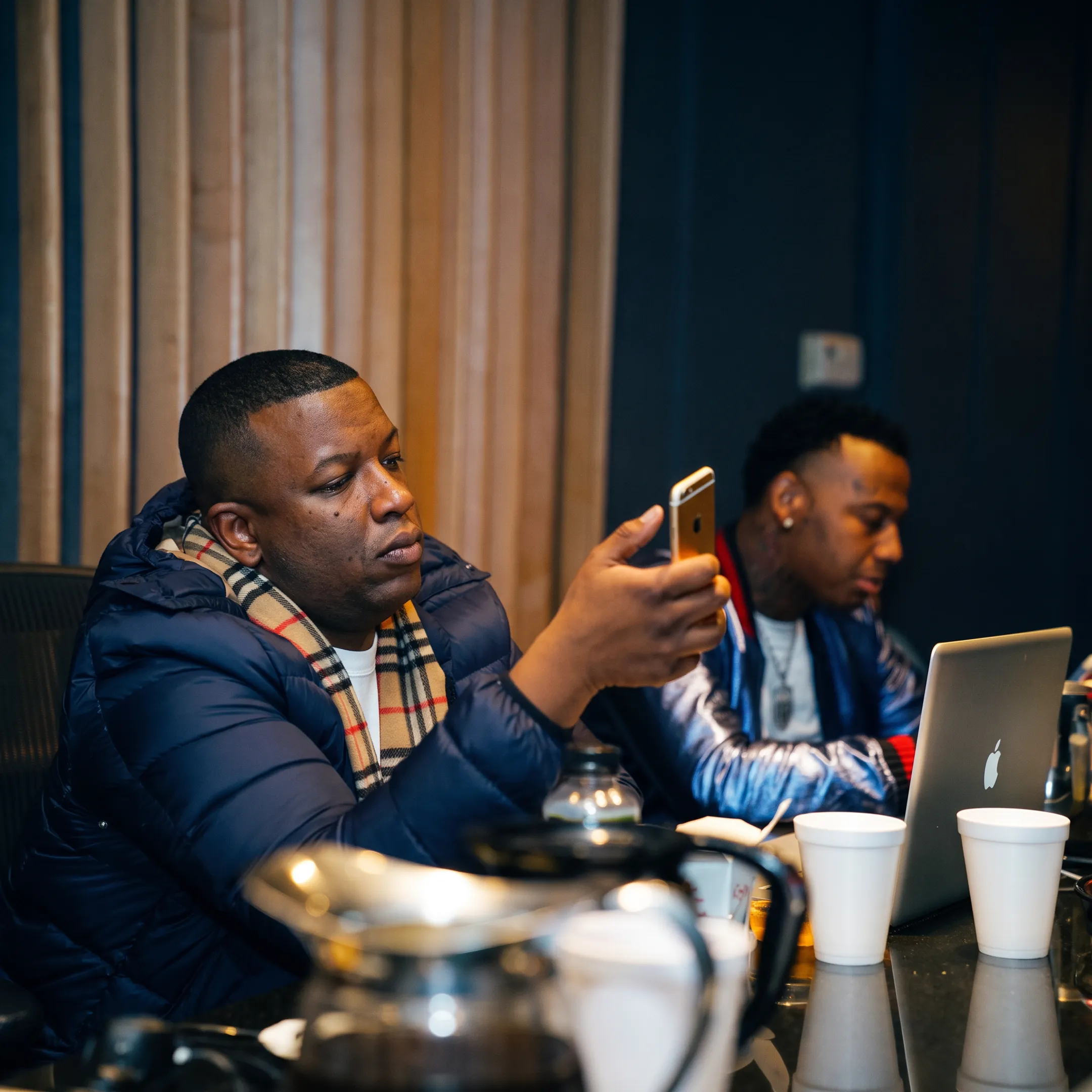 Music public relations team planning an artist campaign in a Los Angeles studio