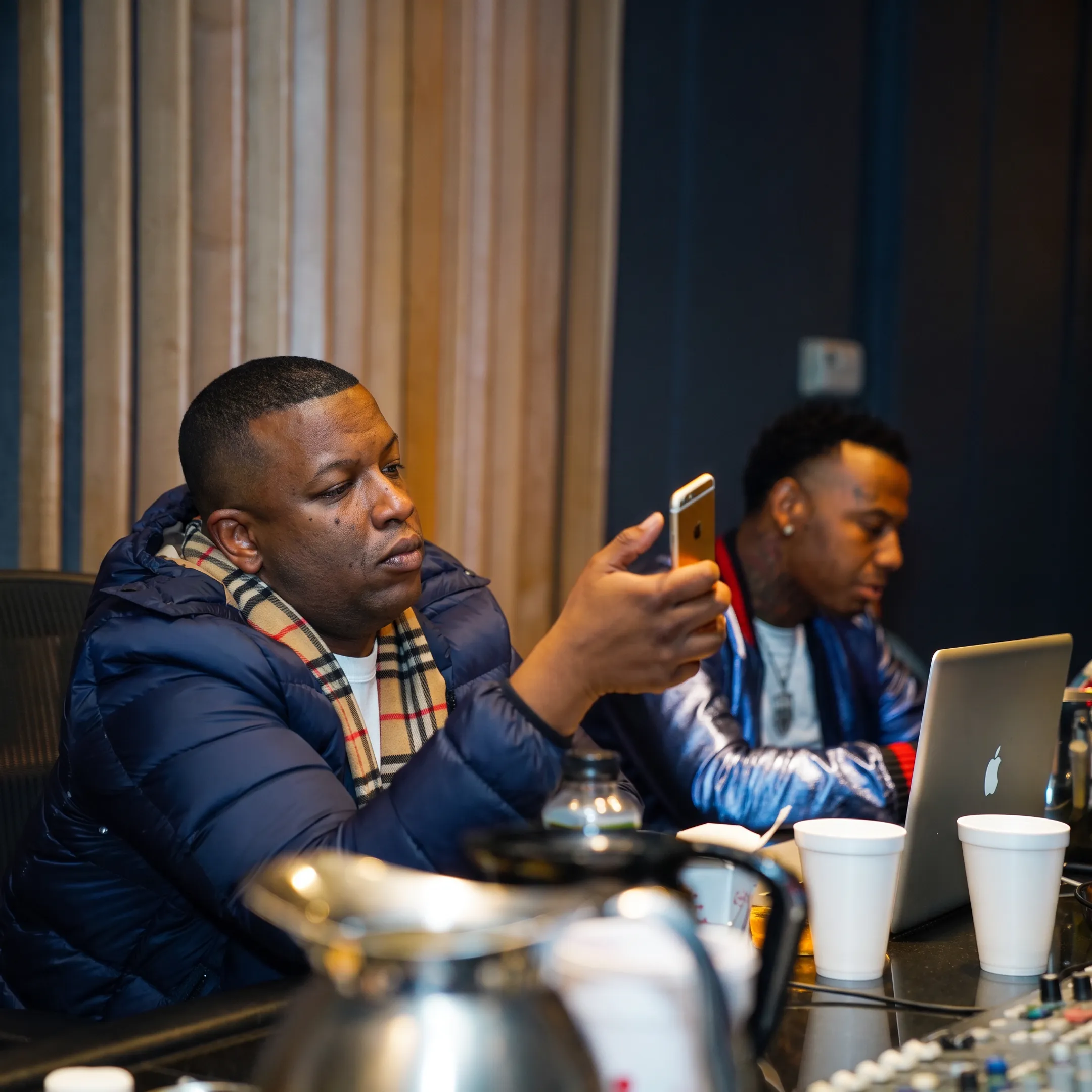 Artist manager meeting with a musician in a Nashville studio