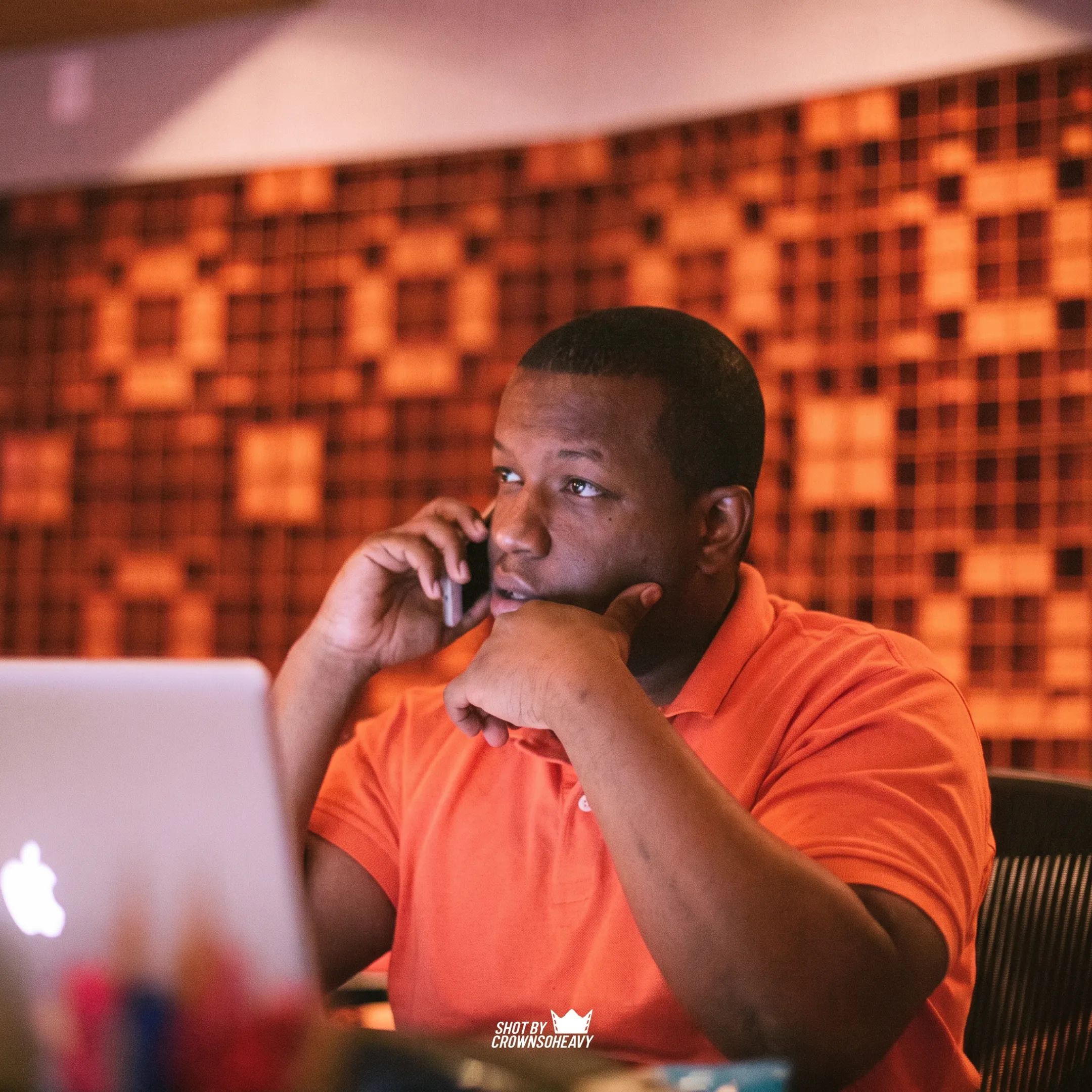 Independent artist reviewing music promotion plans with an entertainment consultant
