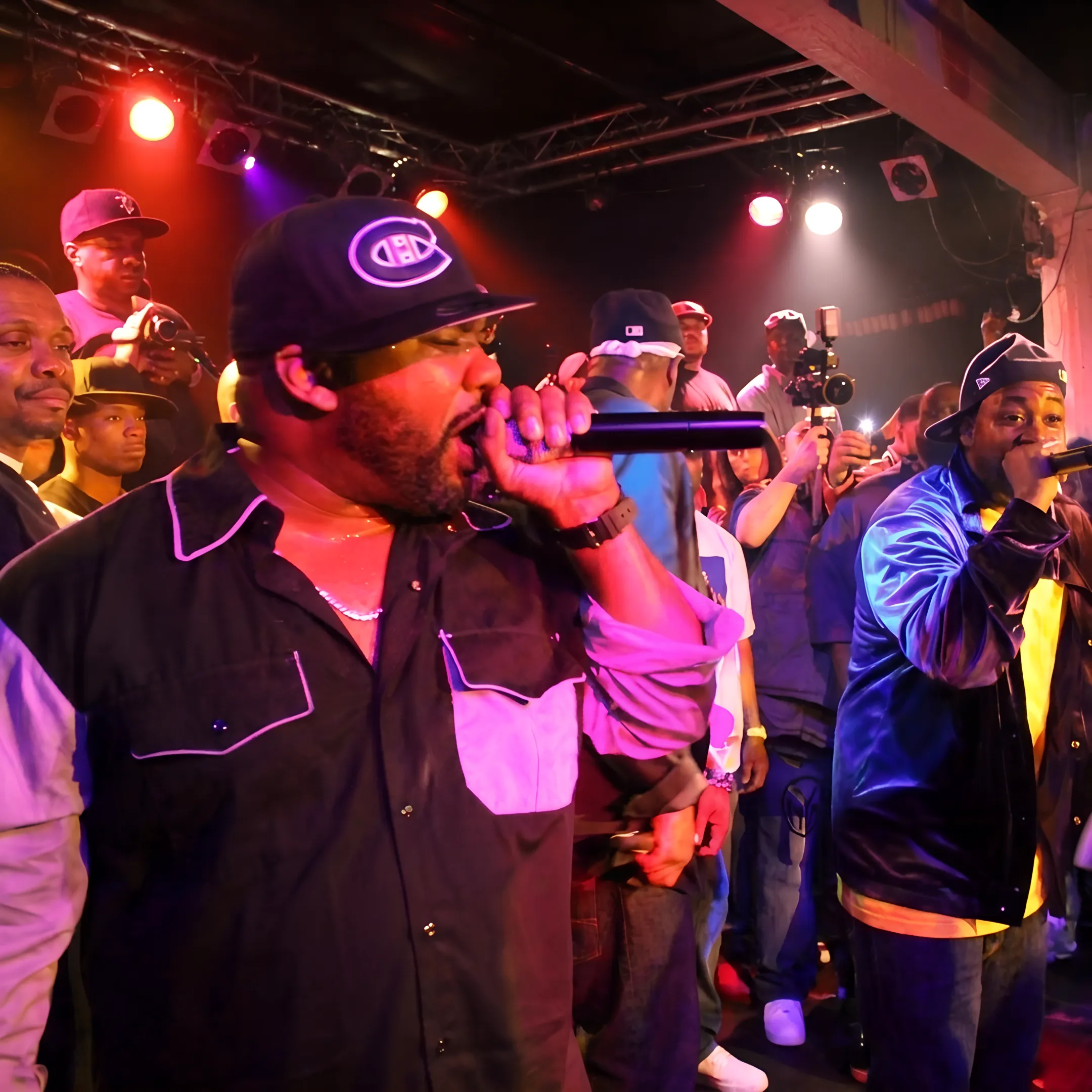 Independent artist performing onstage at a professionally managed music venue