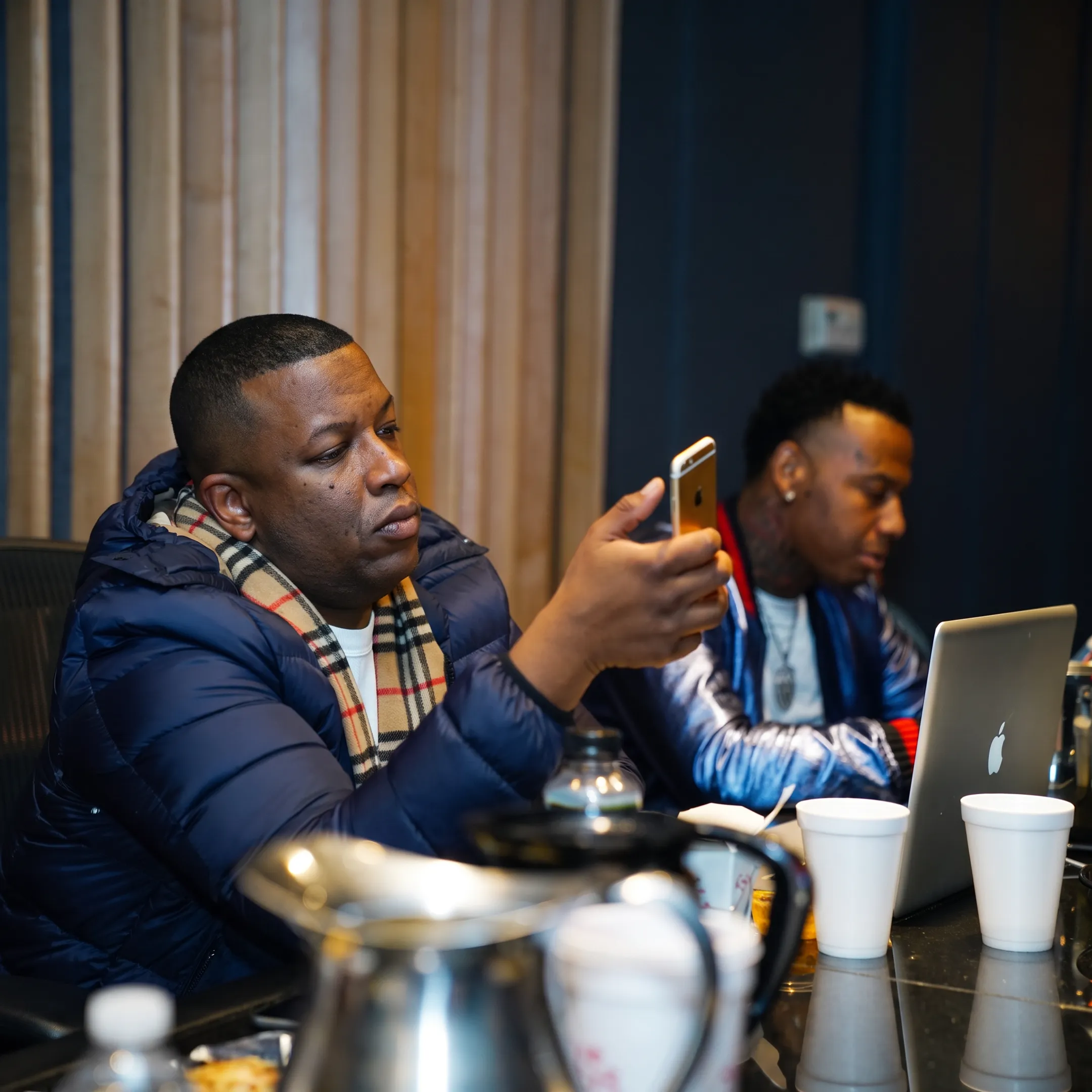 Artist and manager discussing a career plan in a New York studio