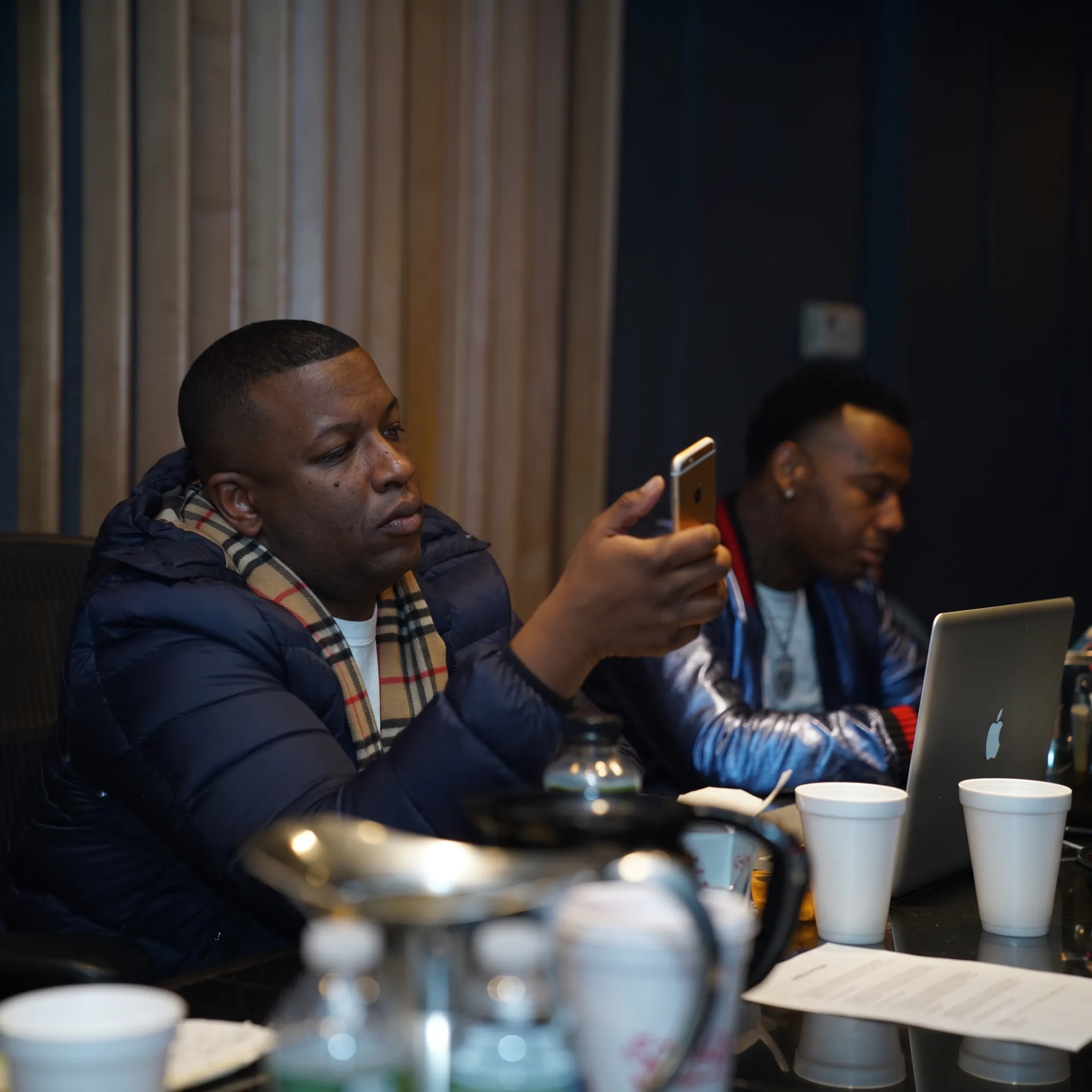 Artist representative discussing a concert booking with an independent musician