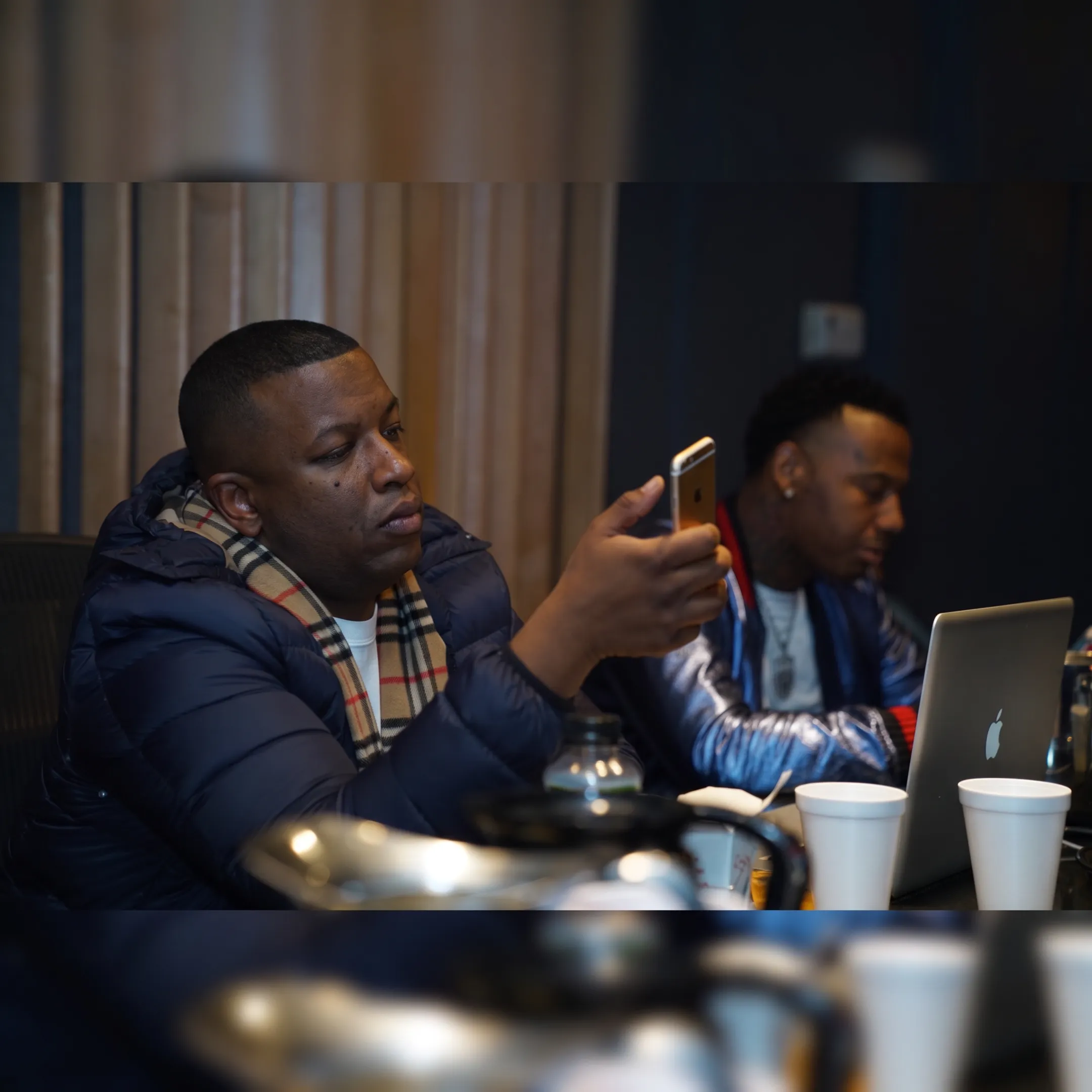 Music booking professional discussing an Atlanta performance opportunity with an artist