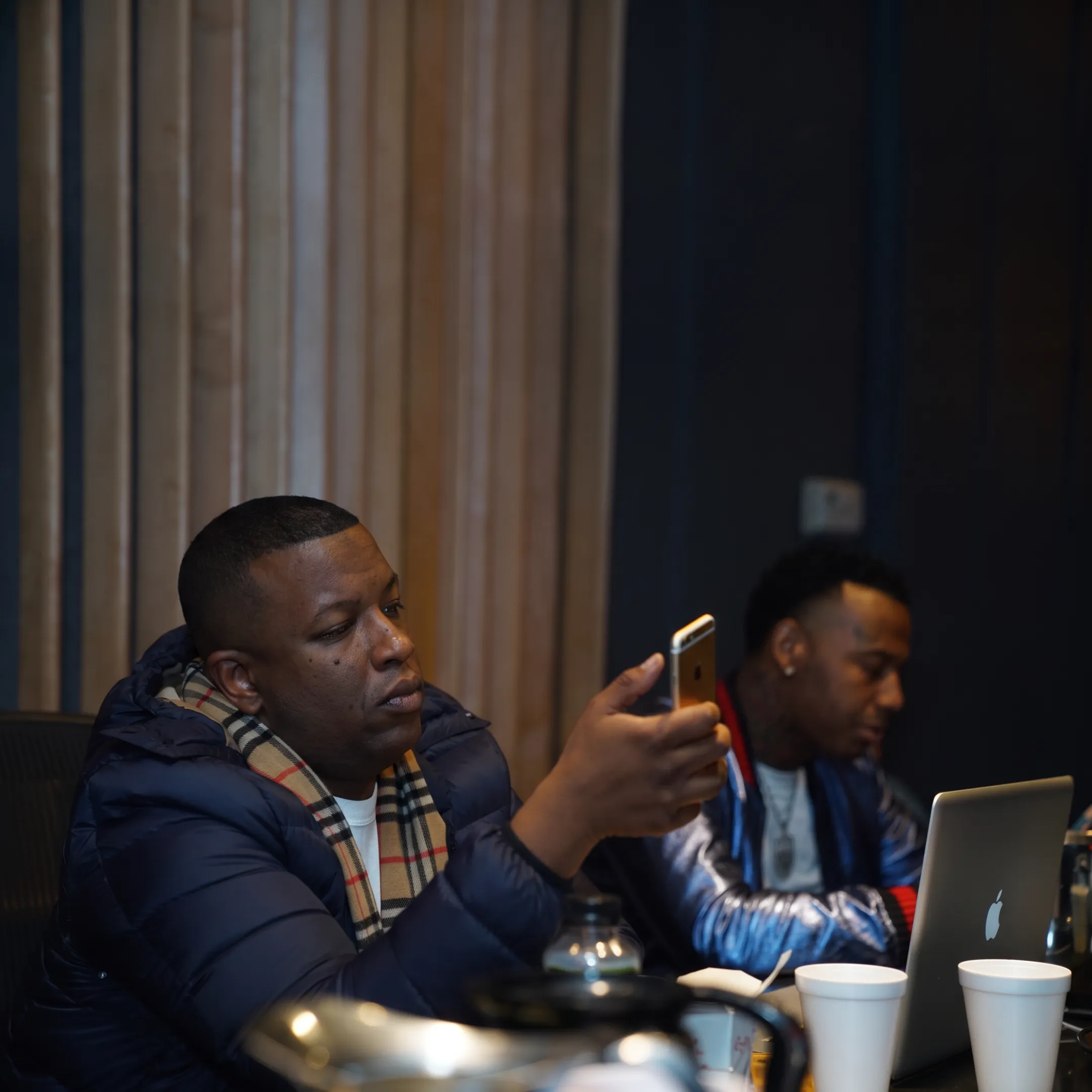 Music manager and hip hop artist discussing branding and release promotion strategy