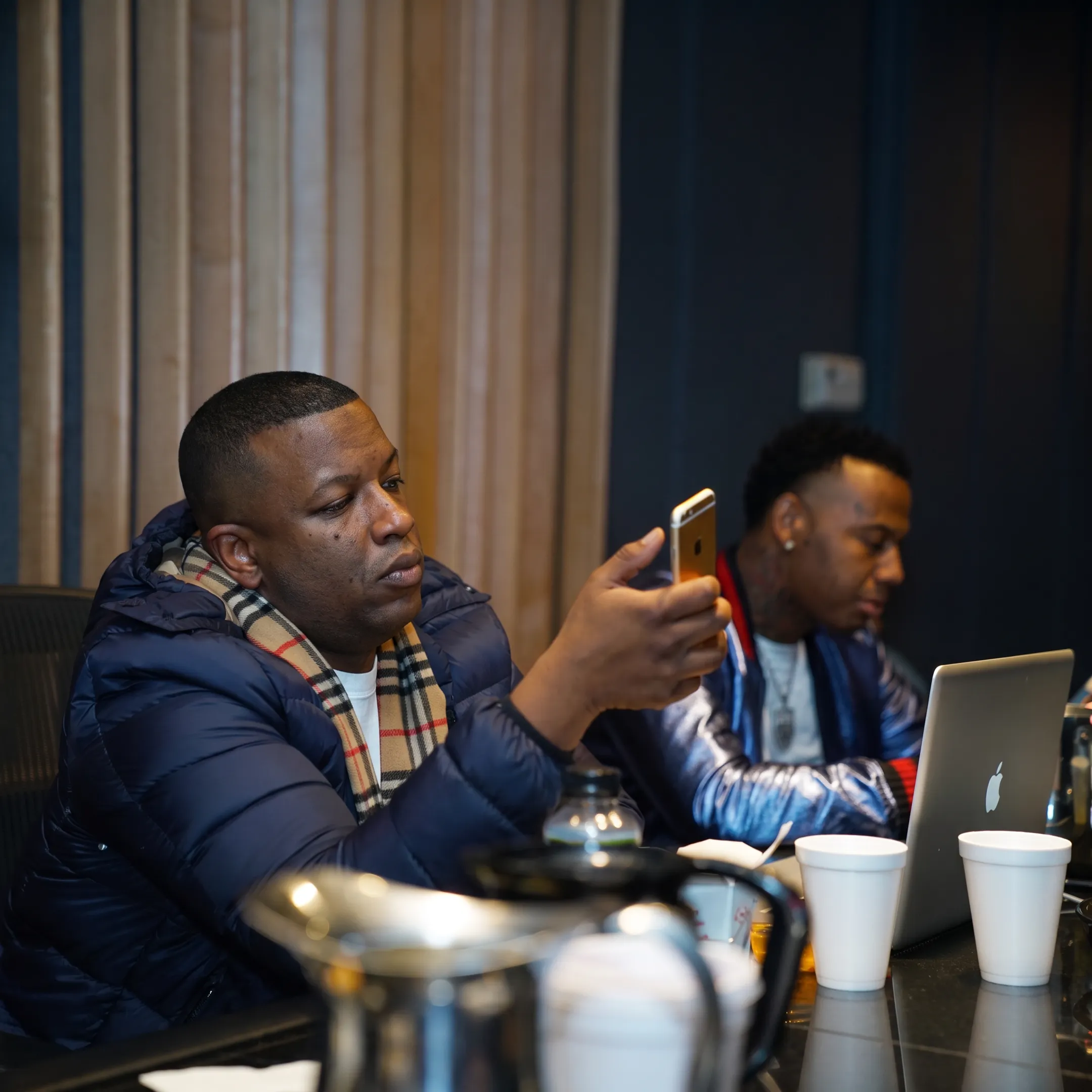Music promotion team reviewing an independent artist campaign