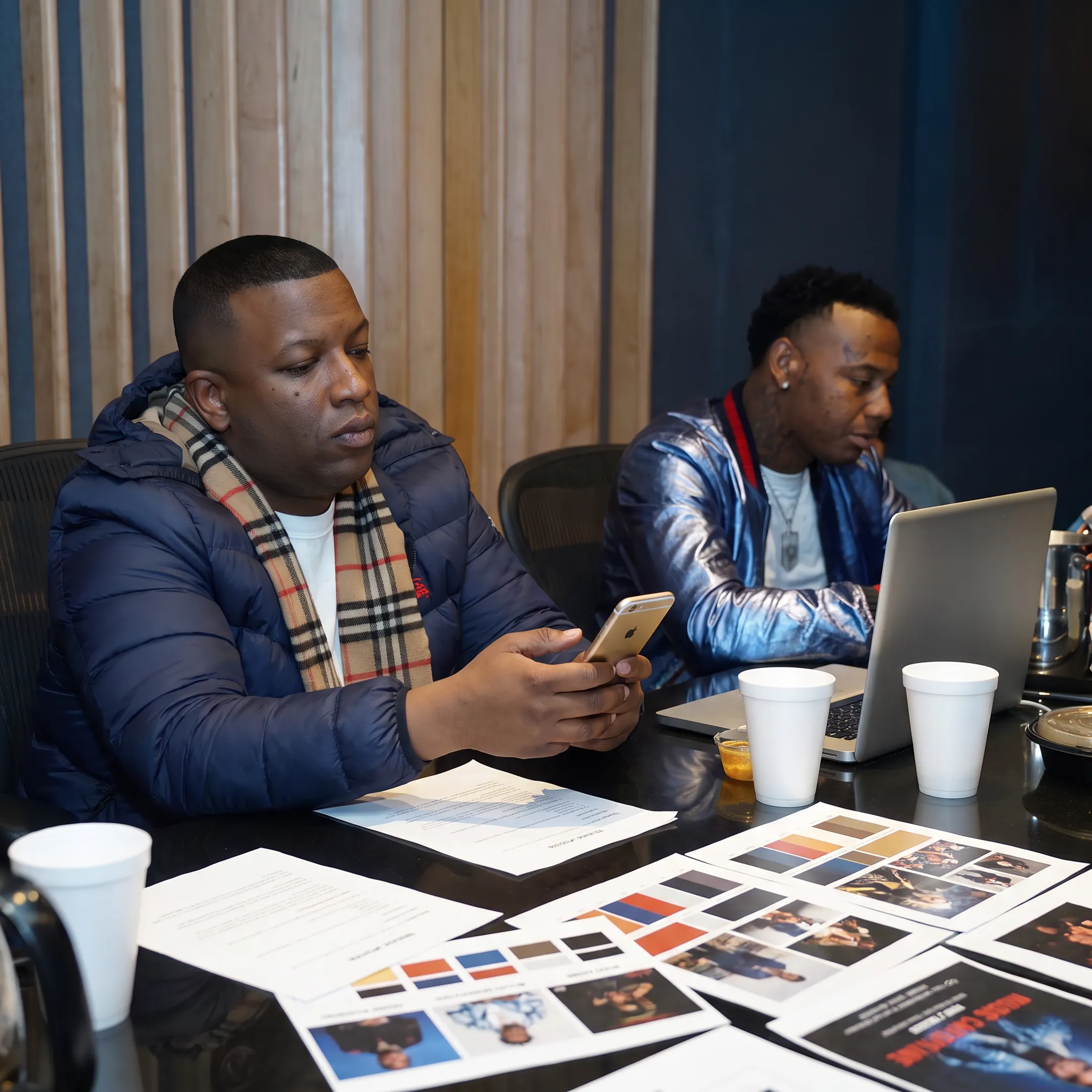 Music strategist reviewing Tik Tok campaign ideas with an independent artist