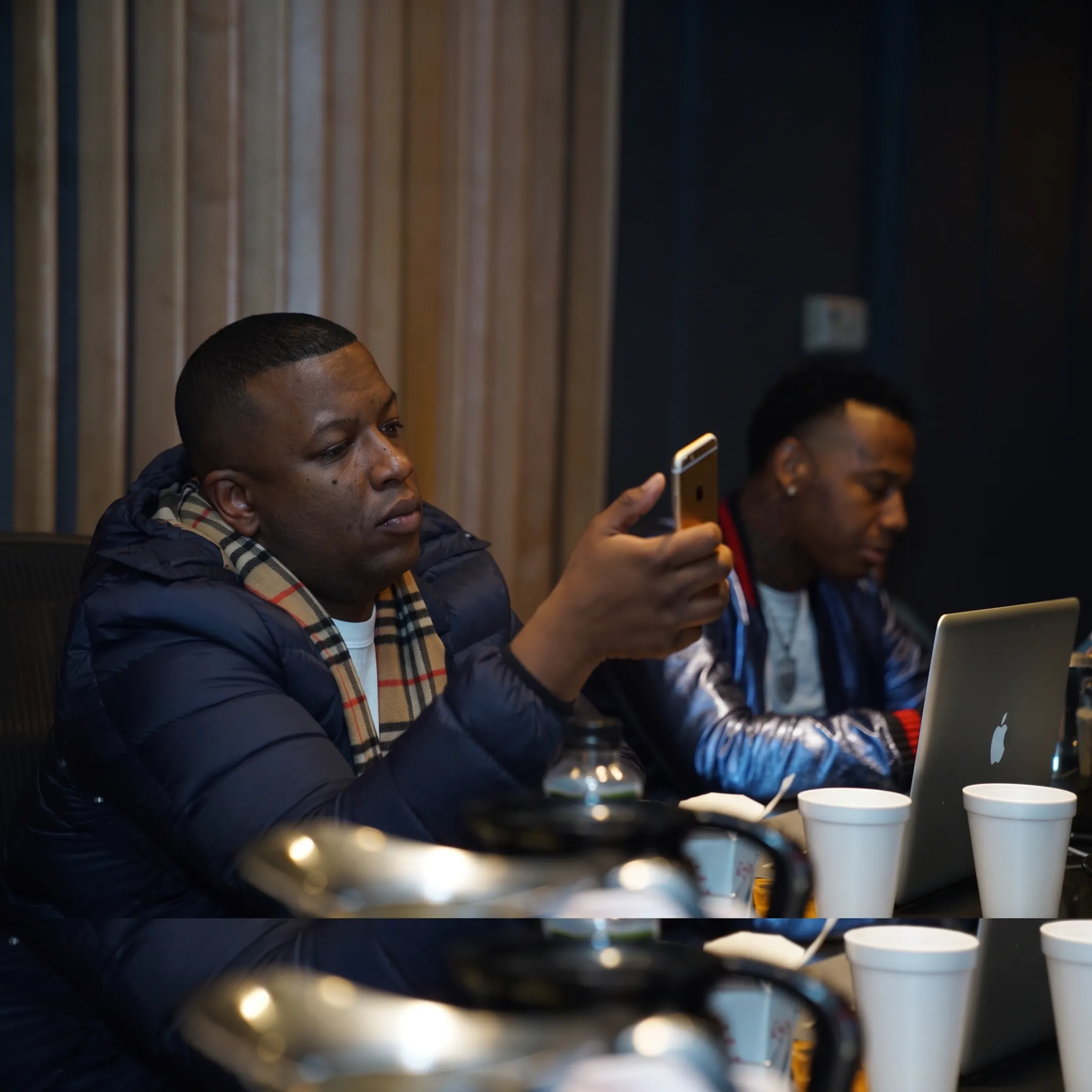 Artist and marketing consultant planning social media content for a music release