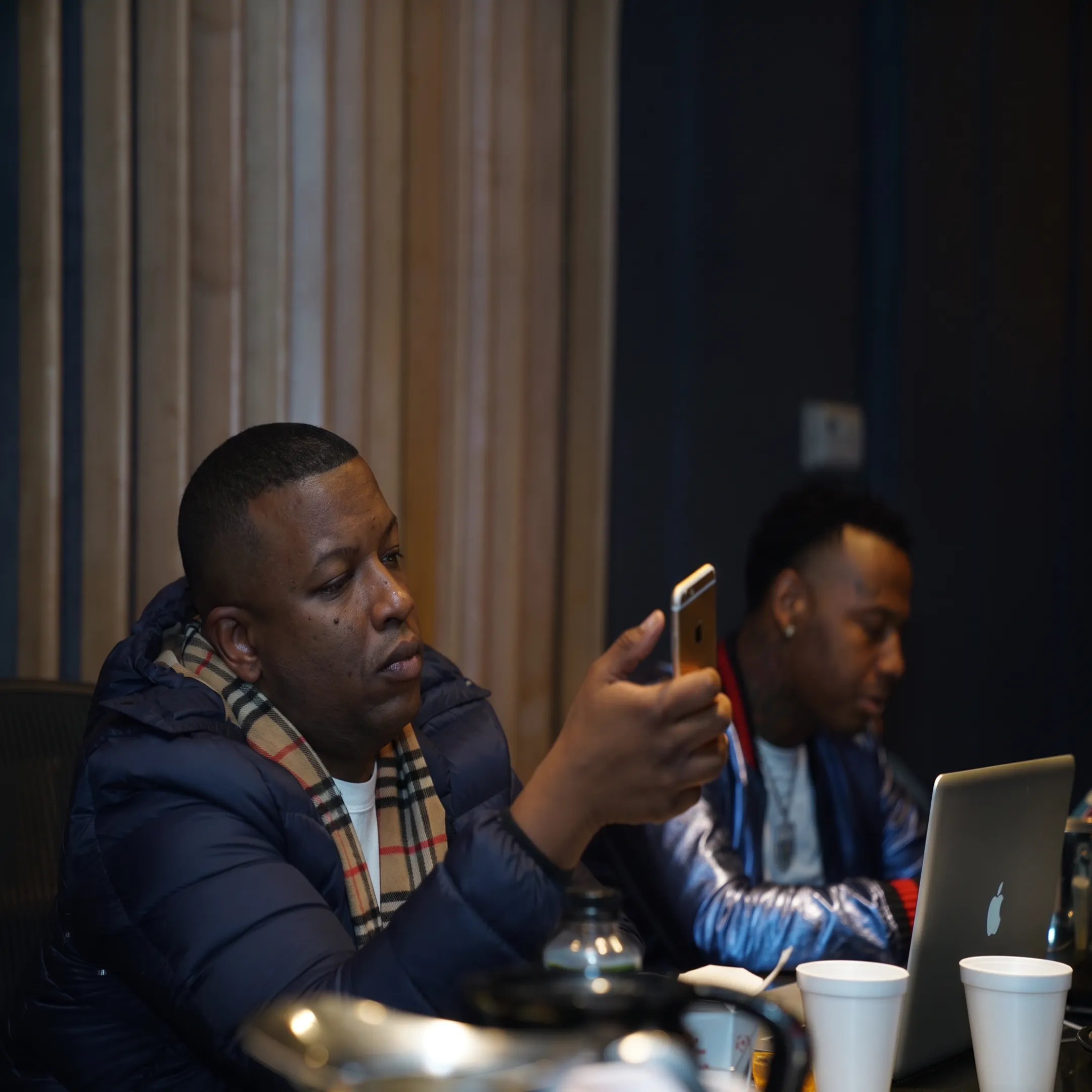 Artist meeting with music manager in a San Diego recording studio