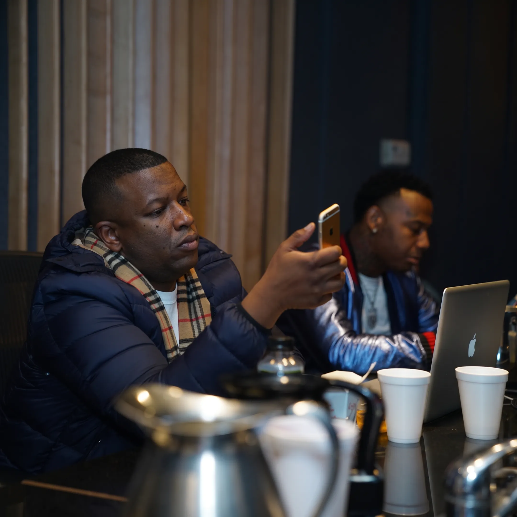Artist meeting with a personal manager in a professional music studio