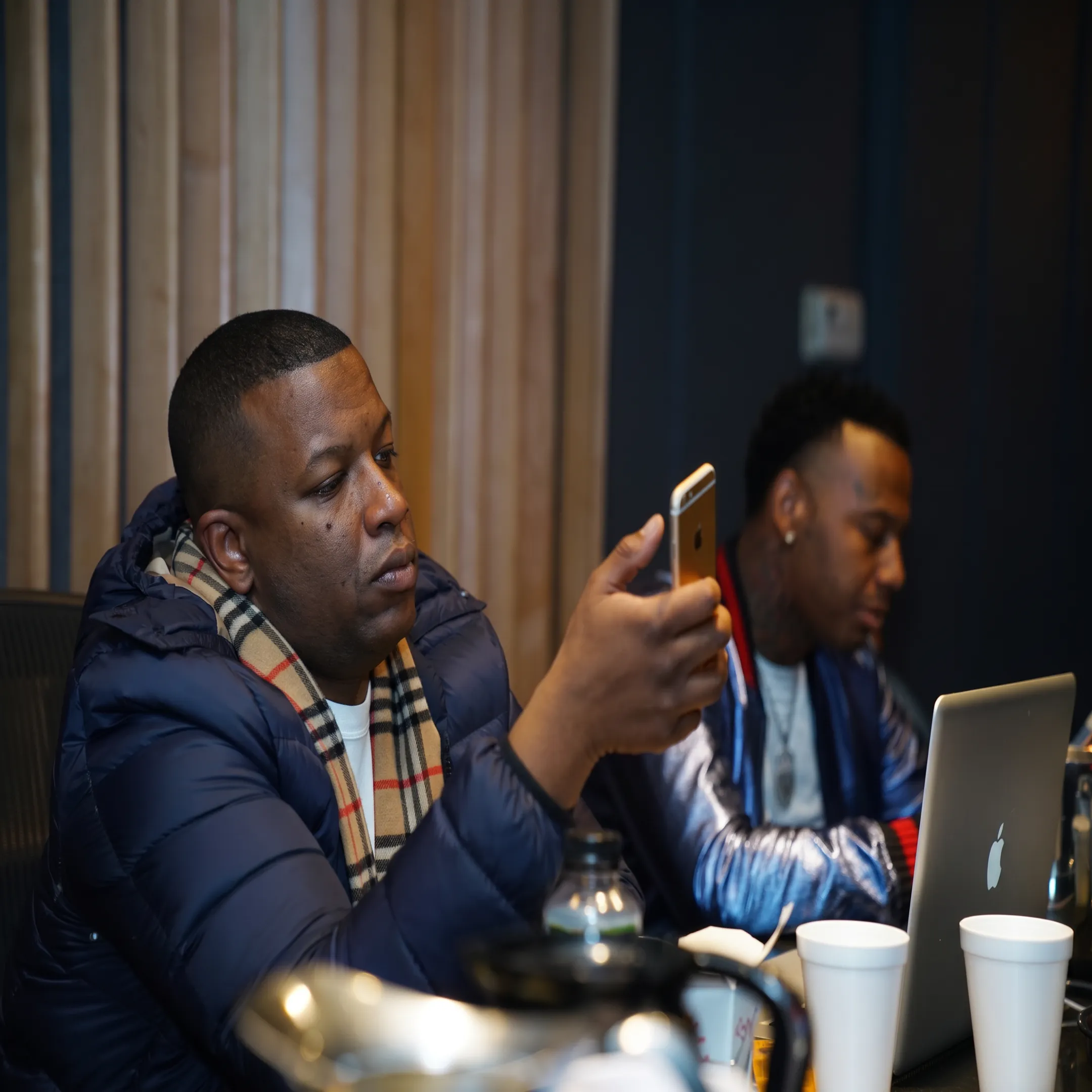 Independent musician discussing release promotion strategy with an entertainment consultant