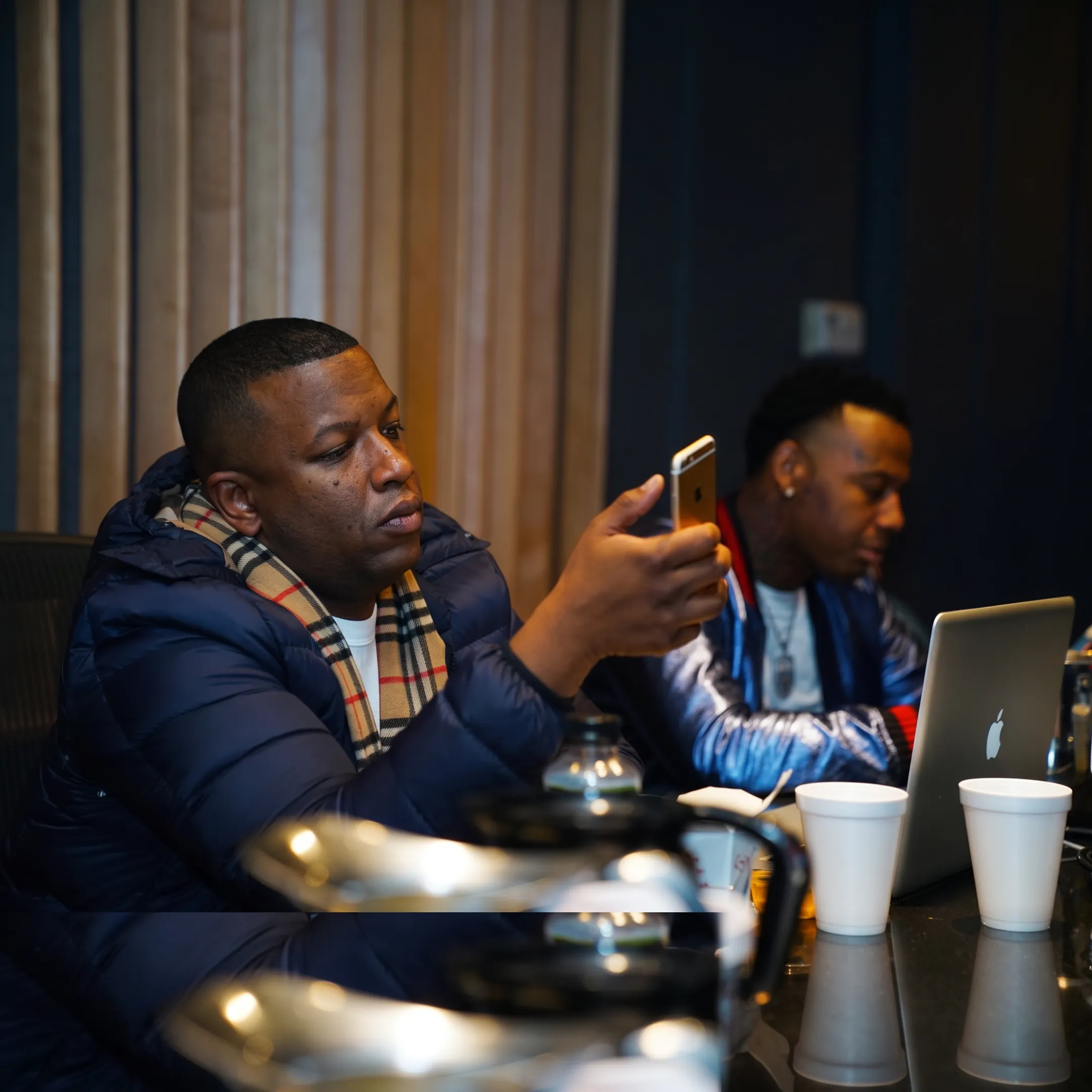 Artist manager meeting with a Seattle musician in a creative studio