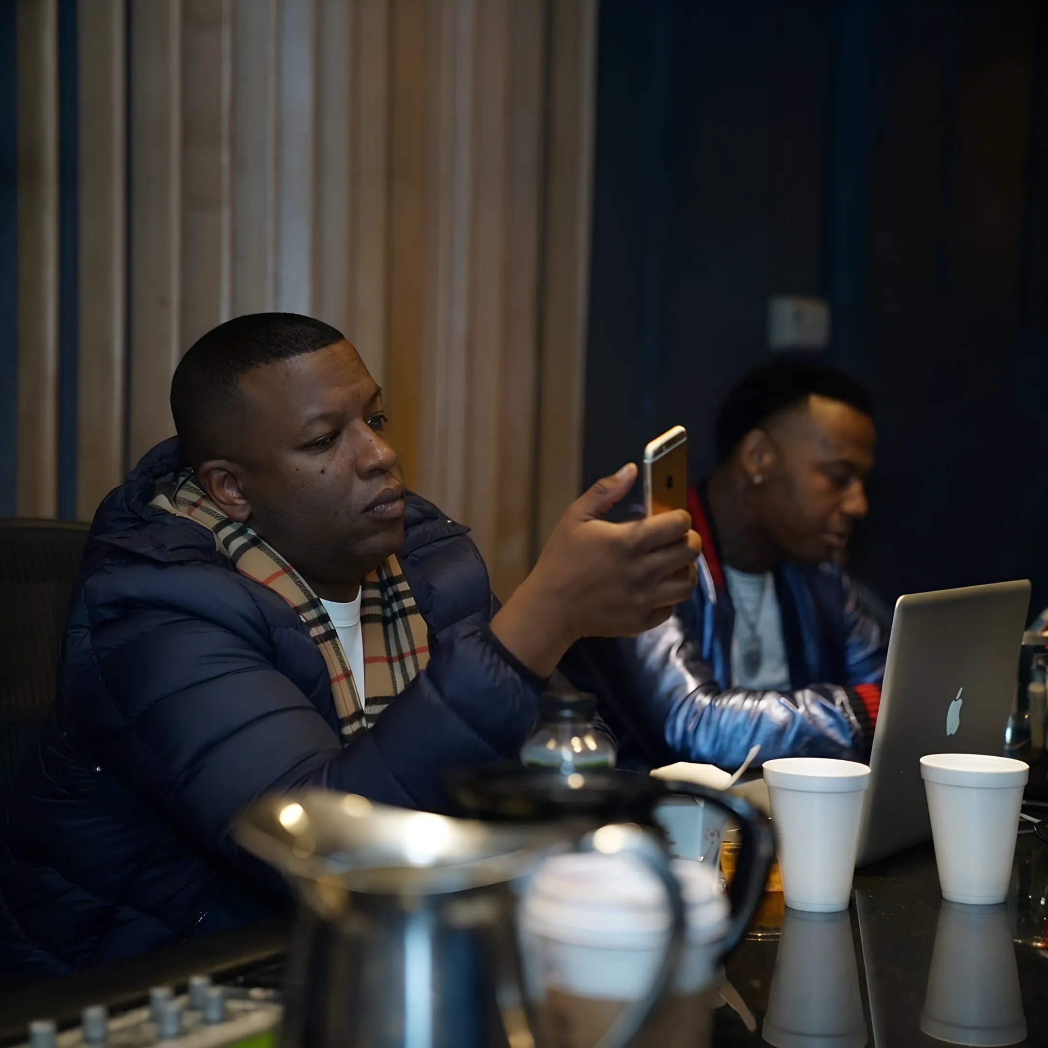 Rap artist and manager planning a music release campaign together