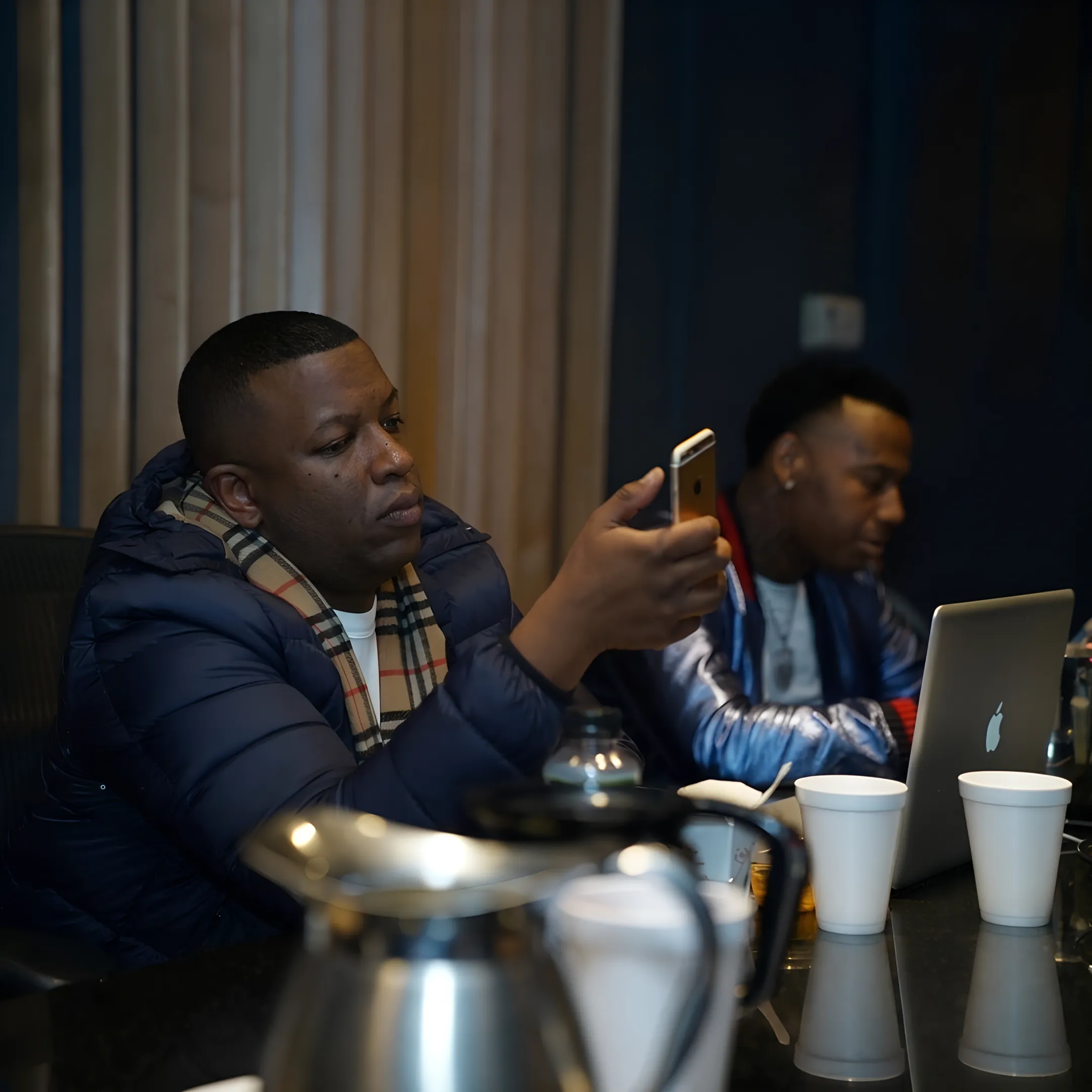 Artist promotion strategy session with campaign materials, social content, and release planning documents