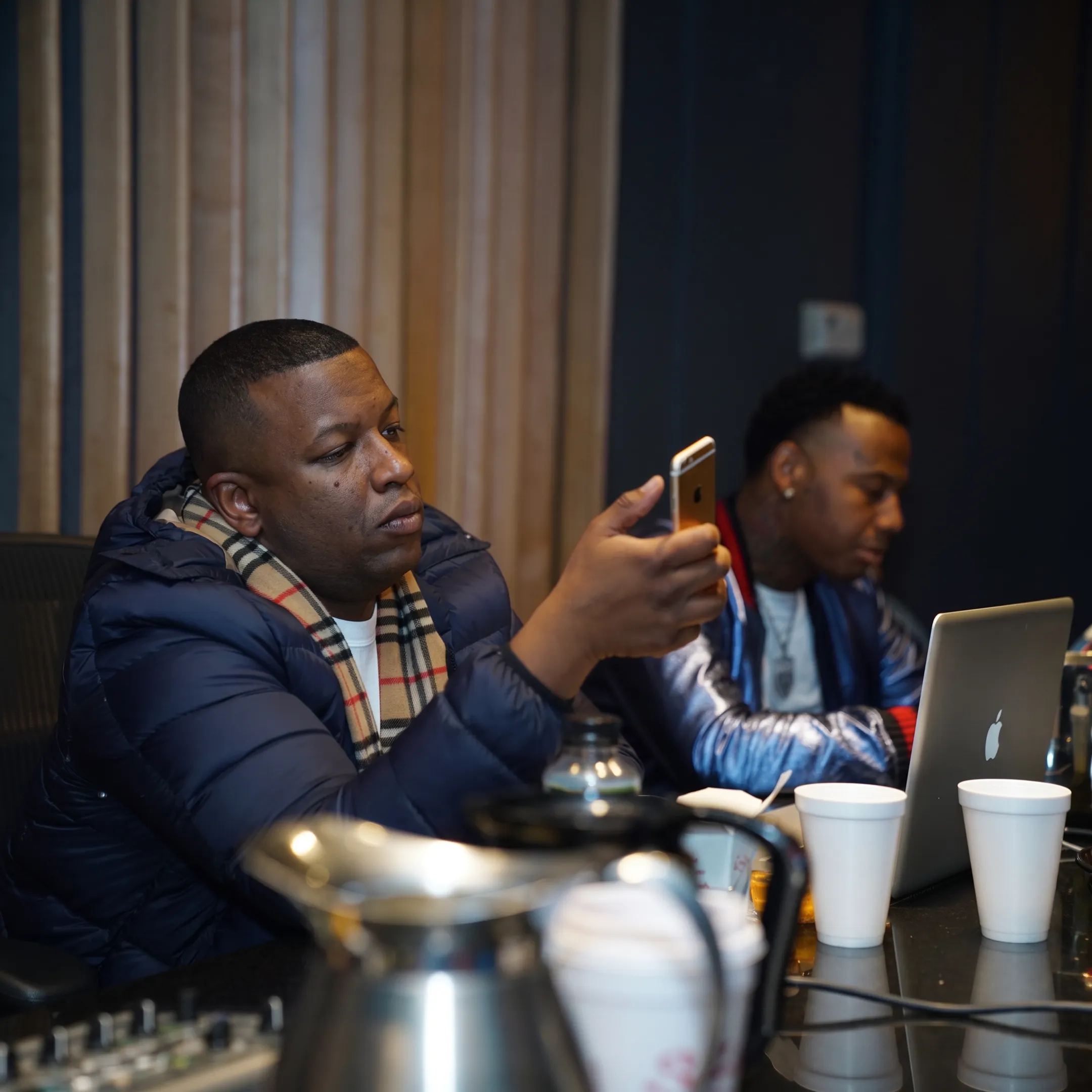 Music marketing team planning an artist promotion campaign with creative assets and release strategy