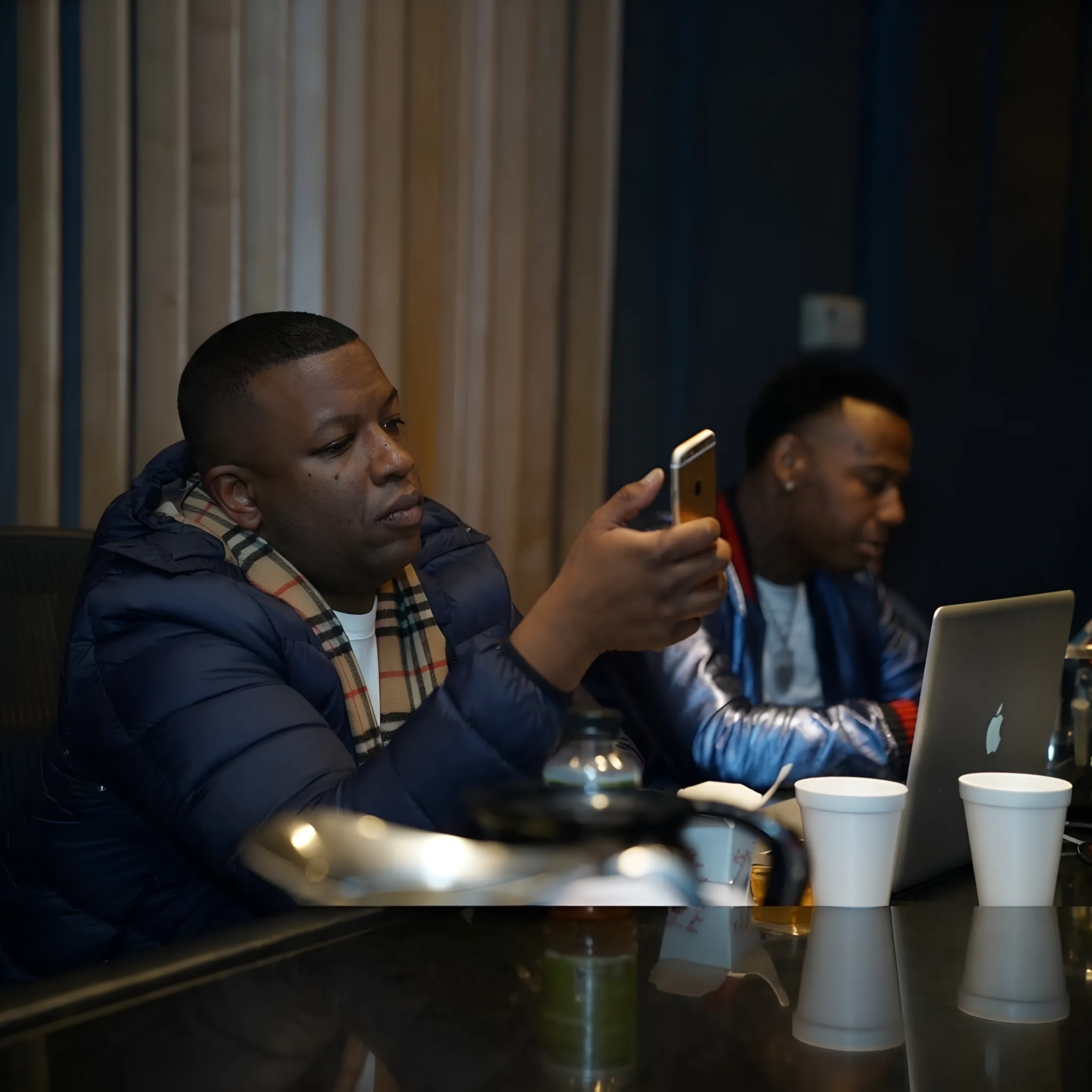 Music professional reviewing artist development plans in a Nashville studio
