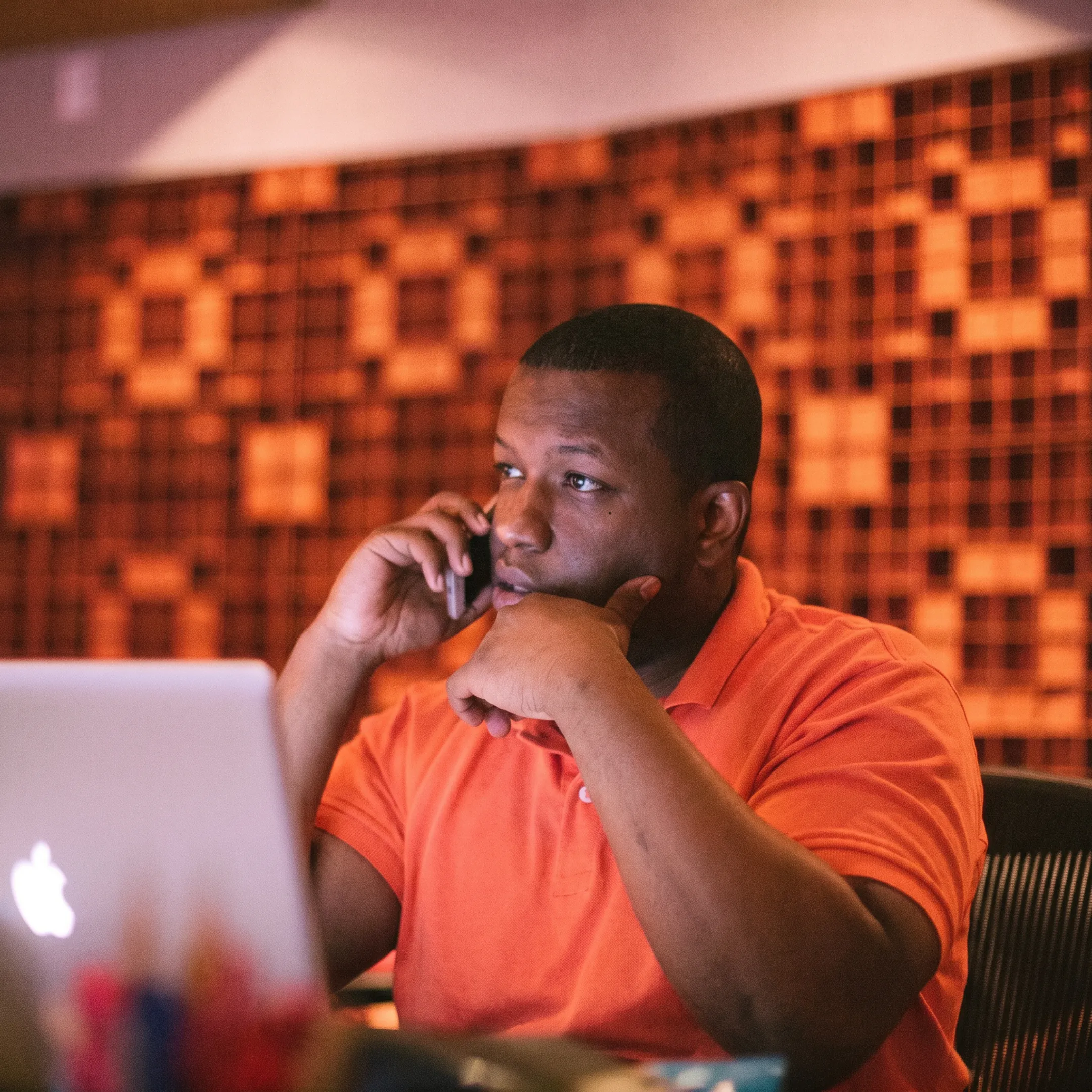 Independent rap artist reviewing Instagram promotion strategy with entertainment marketing consultant