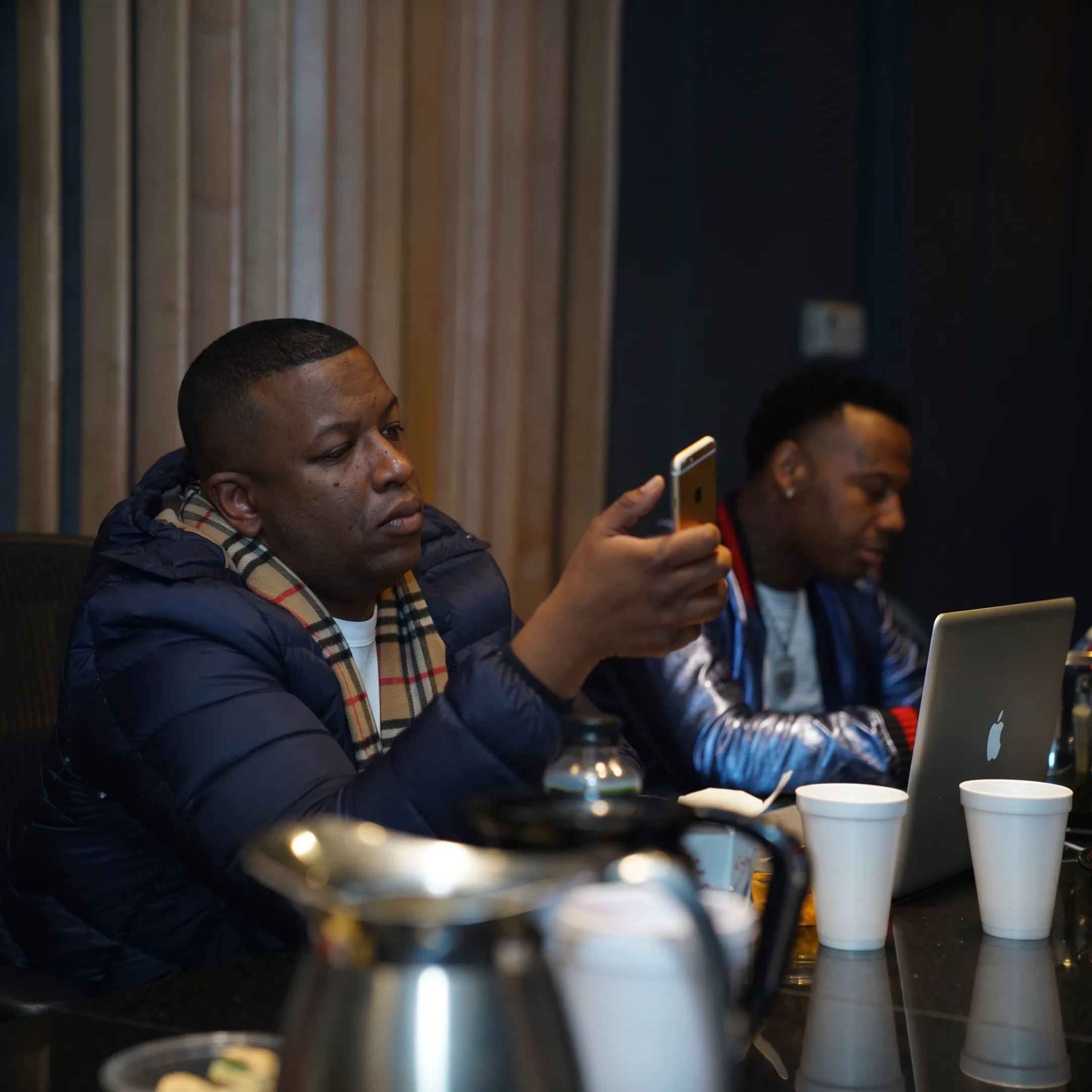 Artist and manager discussing music career plans