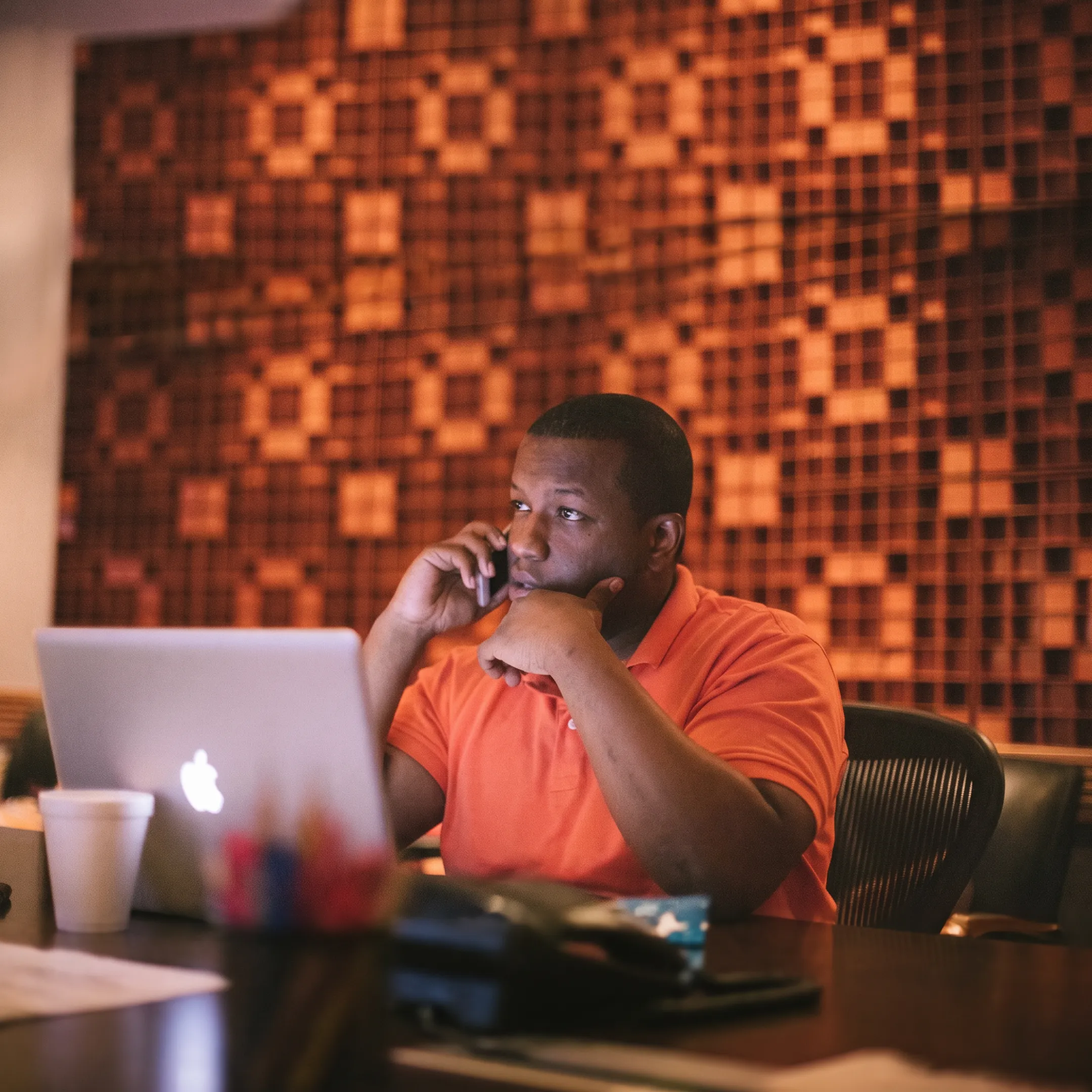 Independent artist reviewing music promotion plans with an entertainment consultant
