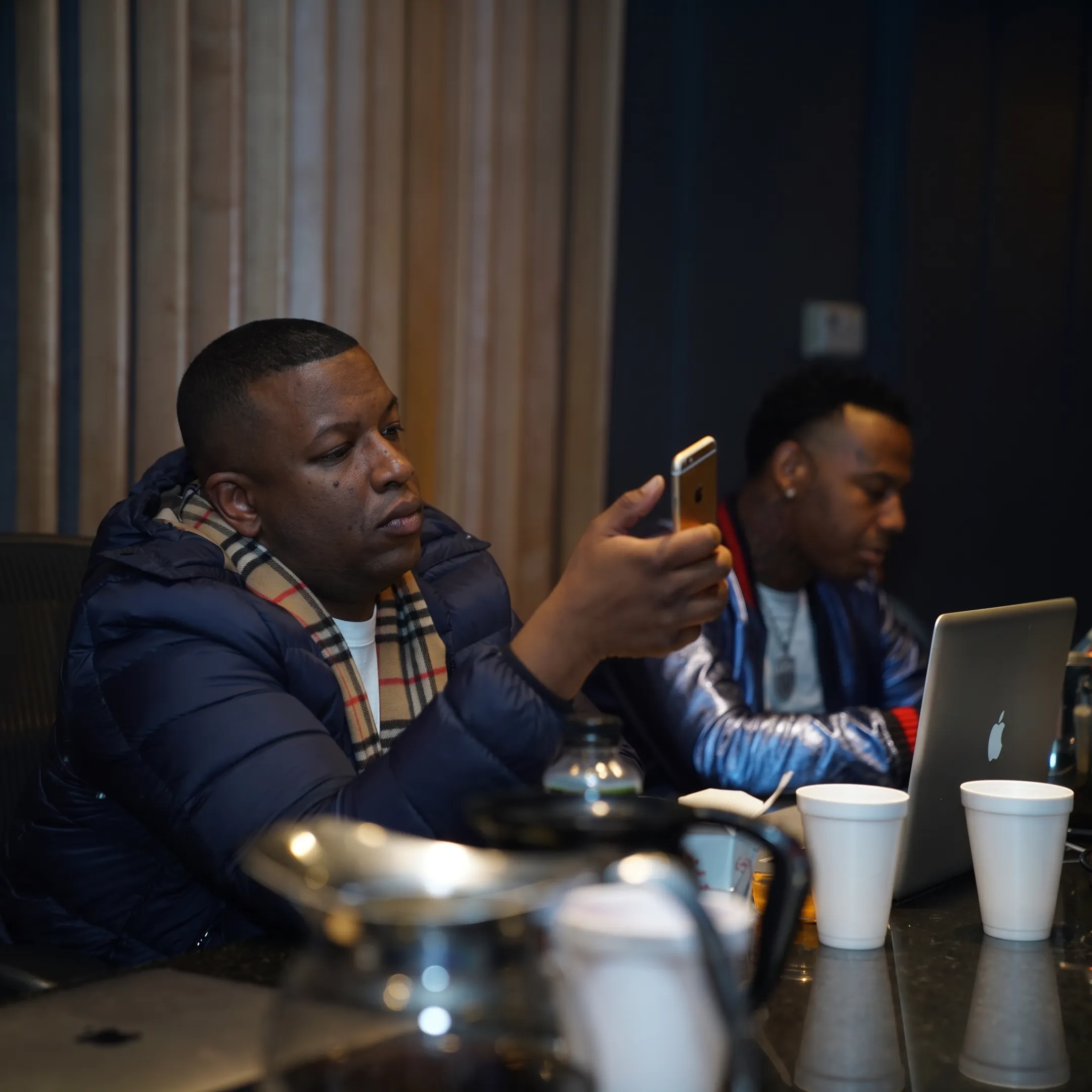 Music promotion team planning an artist release campaign with creative assets and strategy notes