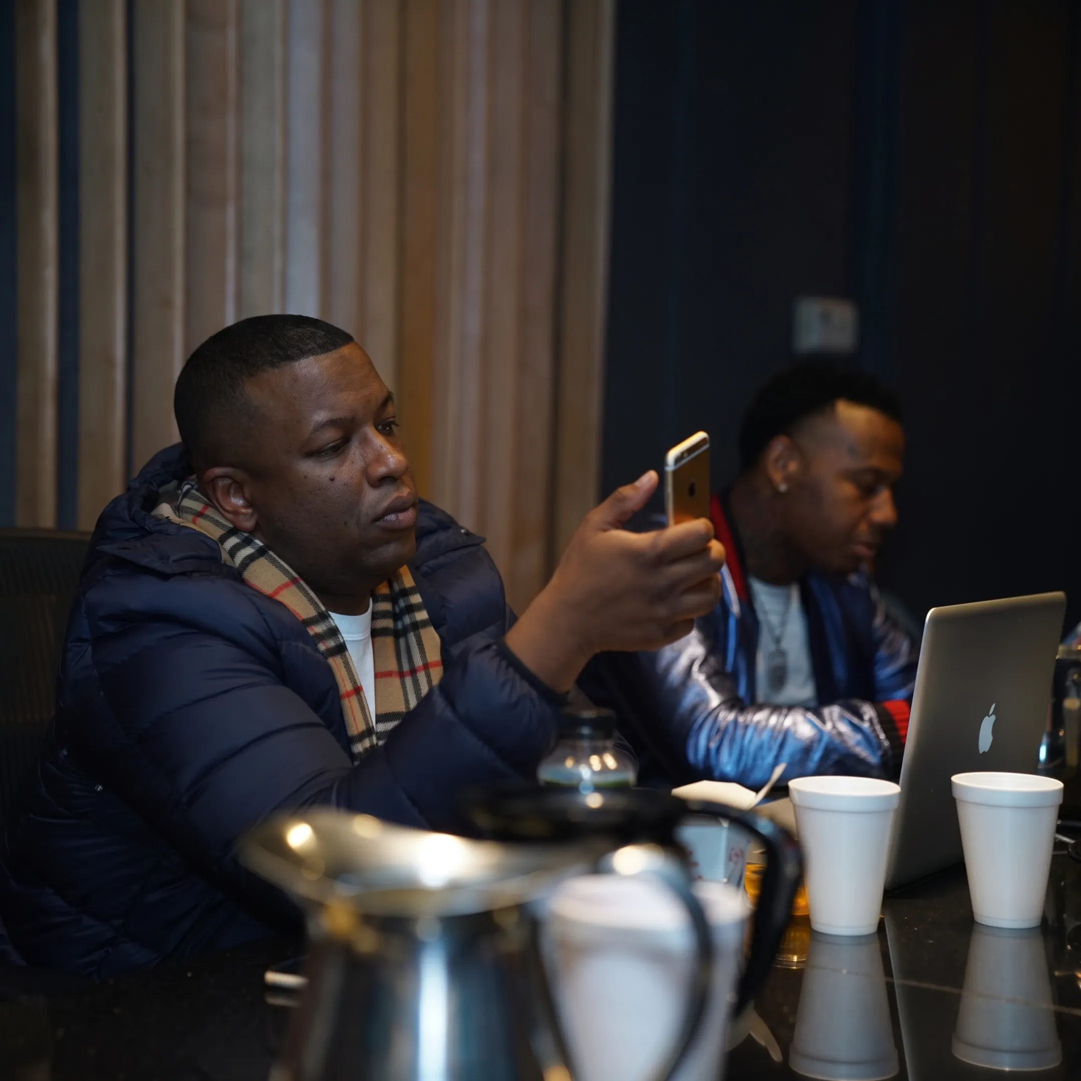 Hip hop promotion strategist discussing an artist release campaign with a performer