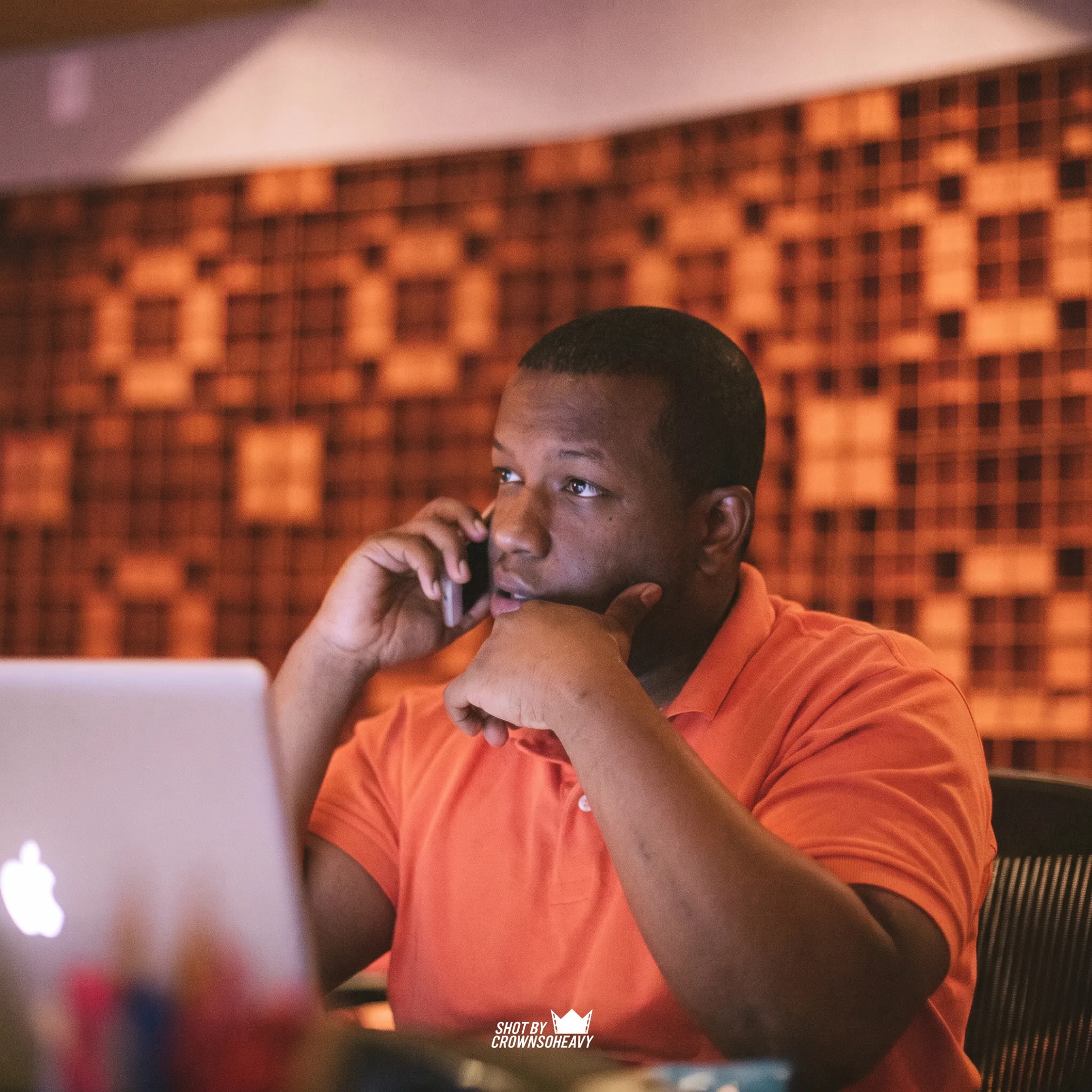 Independent artist reviewing digital music promotion plans with an entertainment consultant