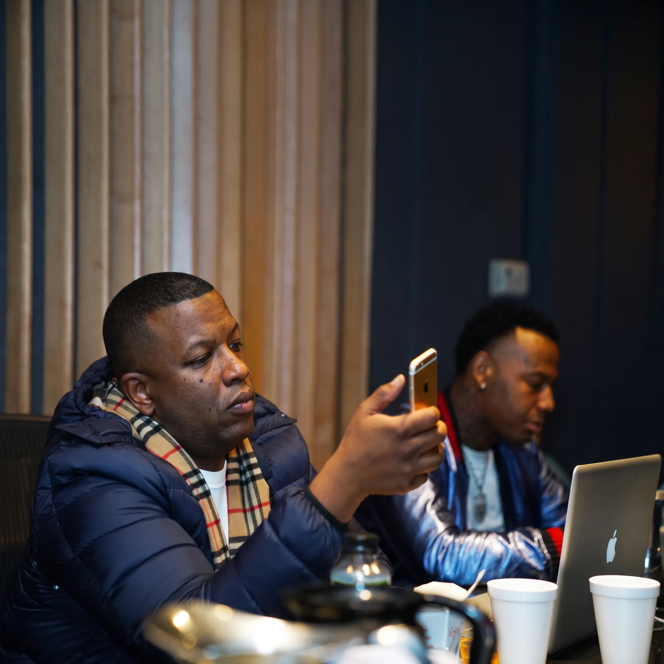 Music manager meeting with an artist to discuss bookings and career strategy