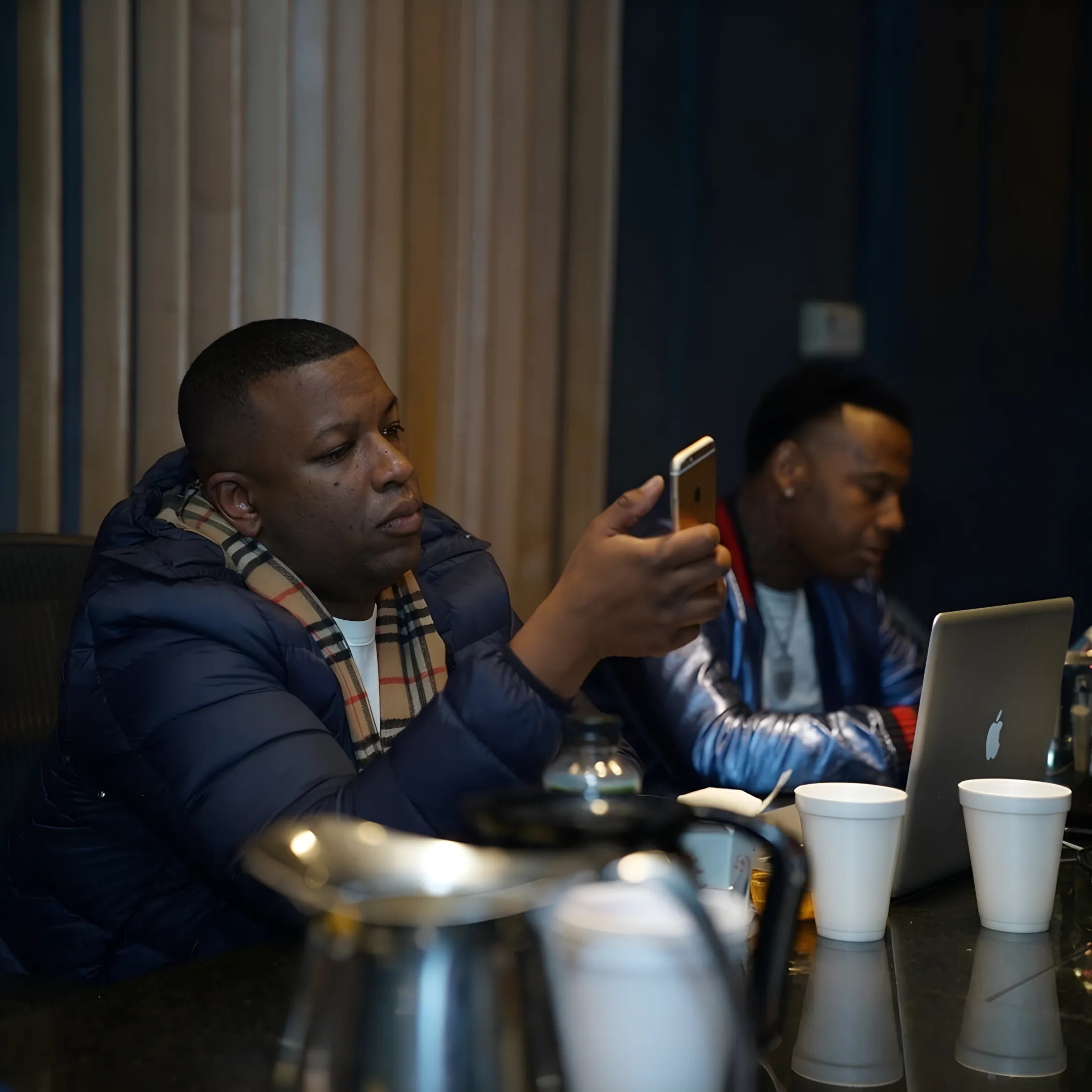 Artist and manager planning a music career strategy