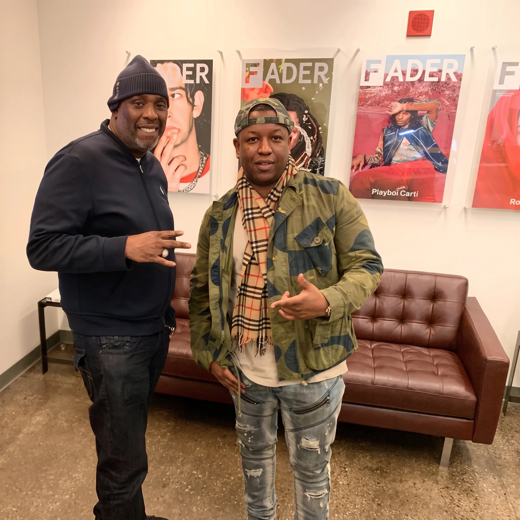 Artist discussing music career strategy with an entertainment consultant in a NYC studio