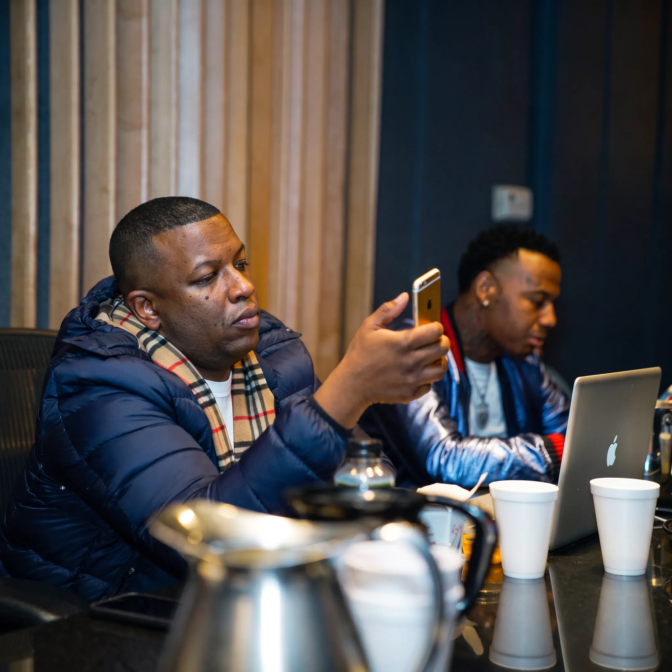 Artist manager discussing career plans with a musician