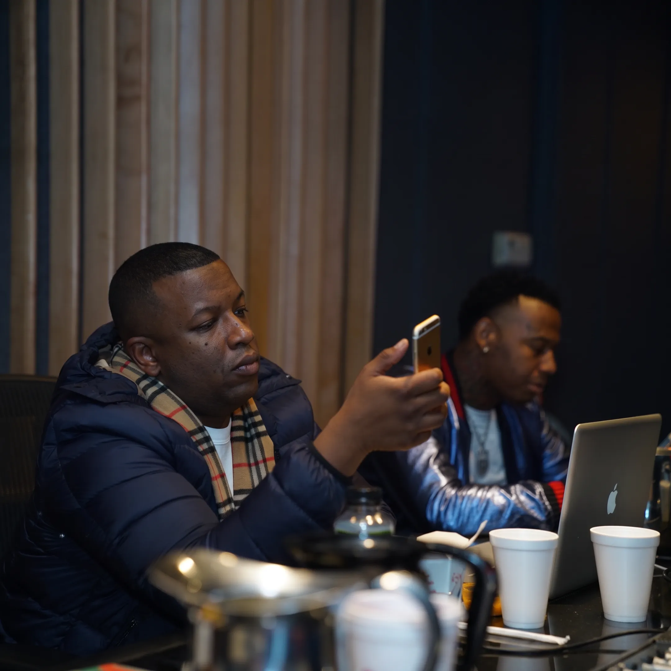 Artist manager reviewing music career plans with a performer in a Florida studio