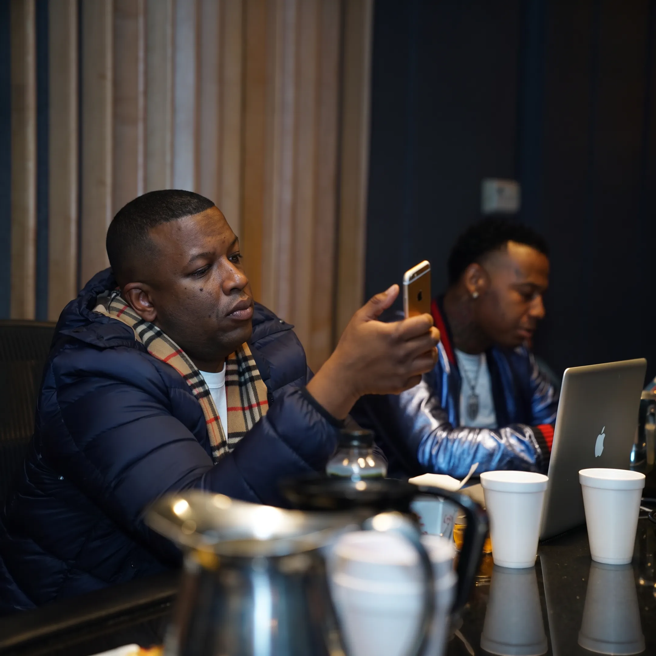 Entertainment manager discussing show bookings and career strategy with recording artist