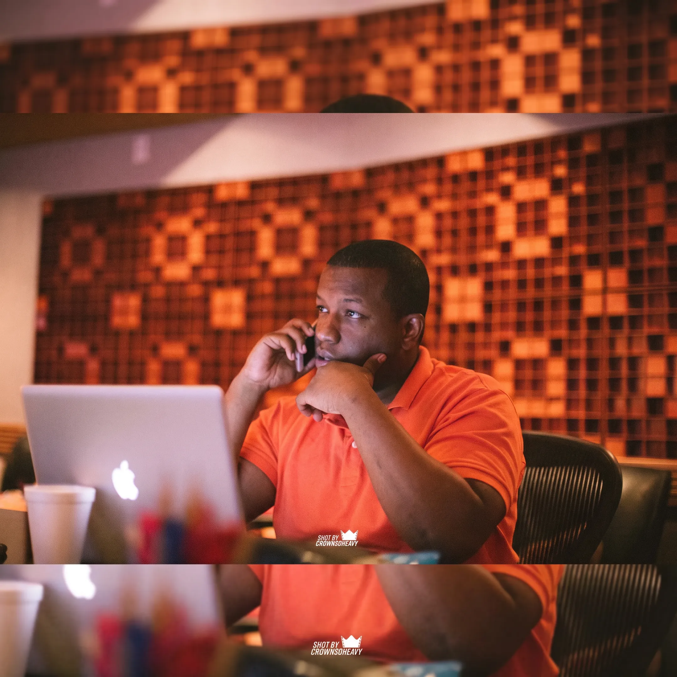Independent artist reviewing online promotion strategy with entertainment consultant
