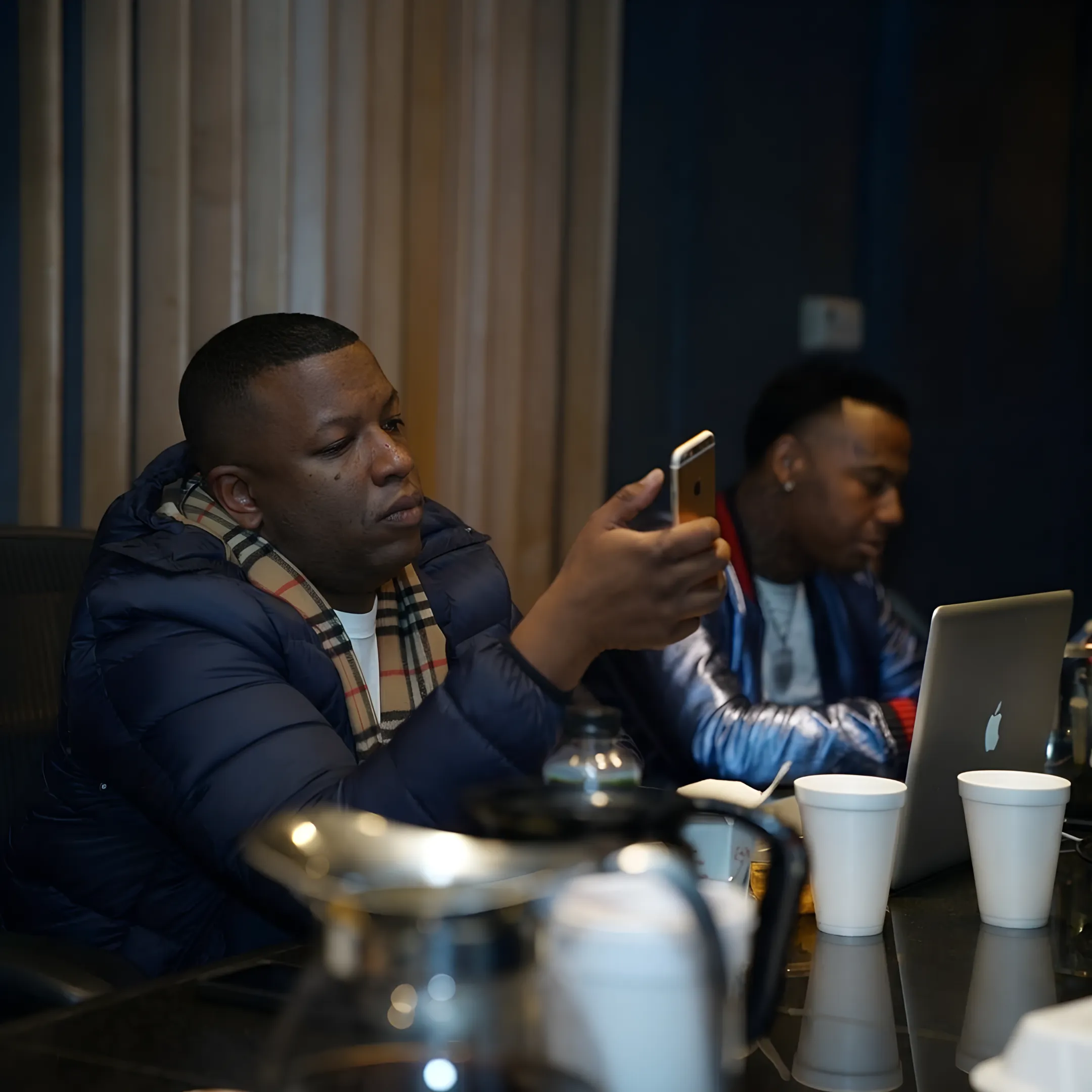 Artist and marketing advisor reviewing an album launch campaign