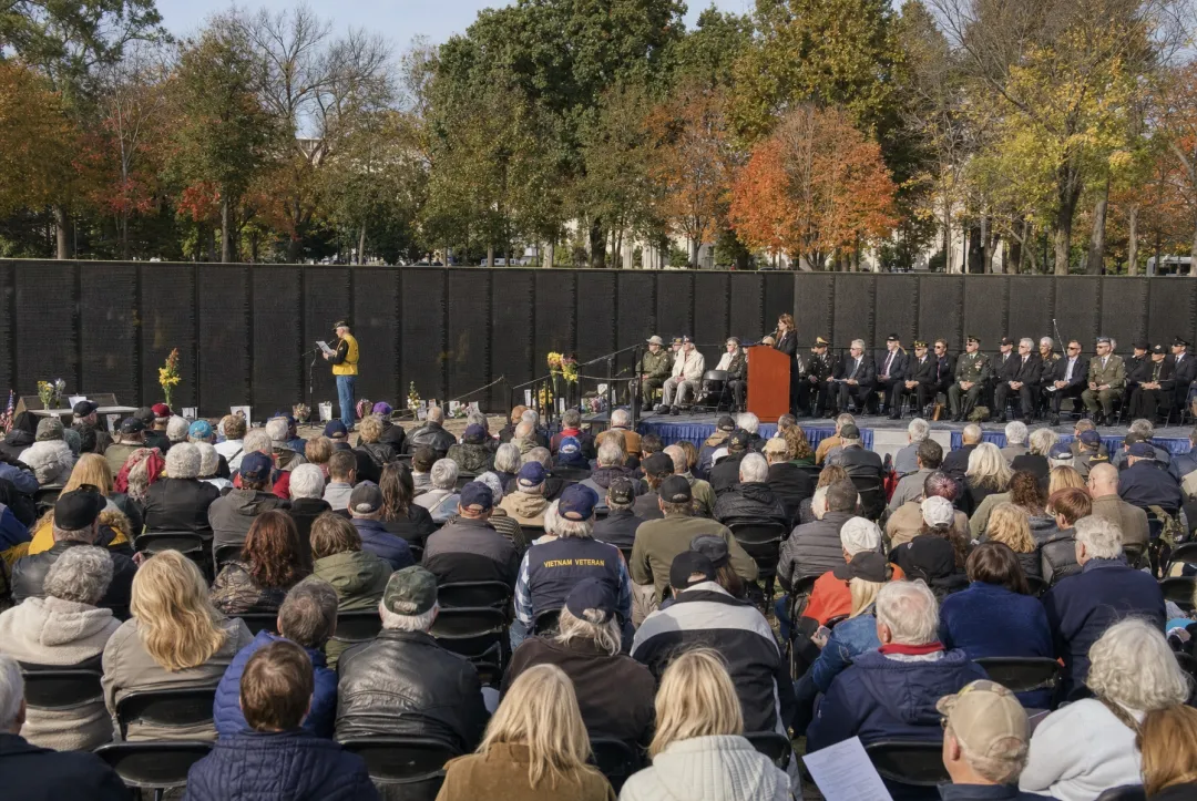 Volunteers reading names during Vietnam Memorial annual ceremony
