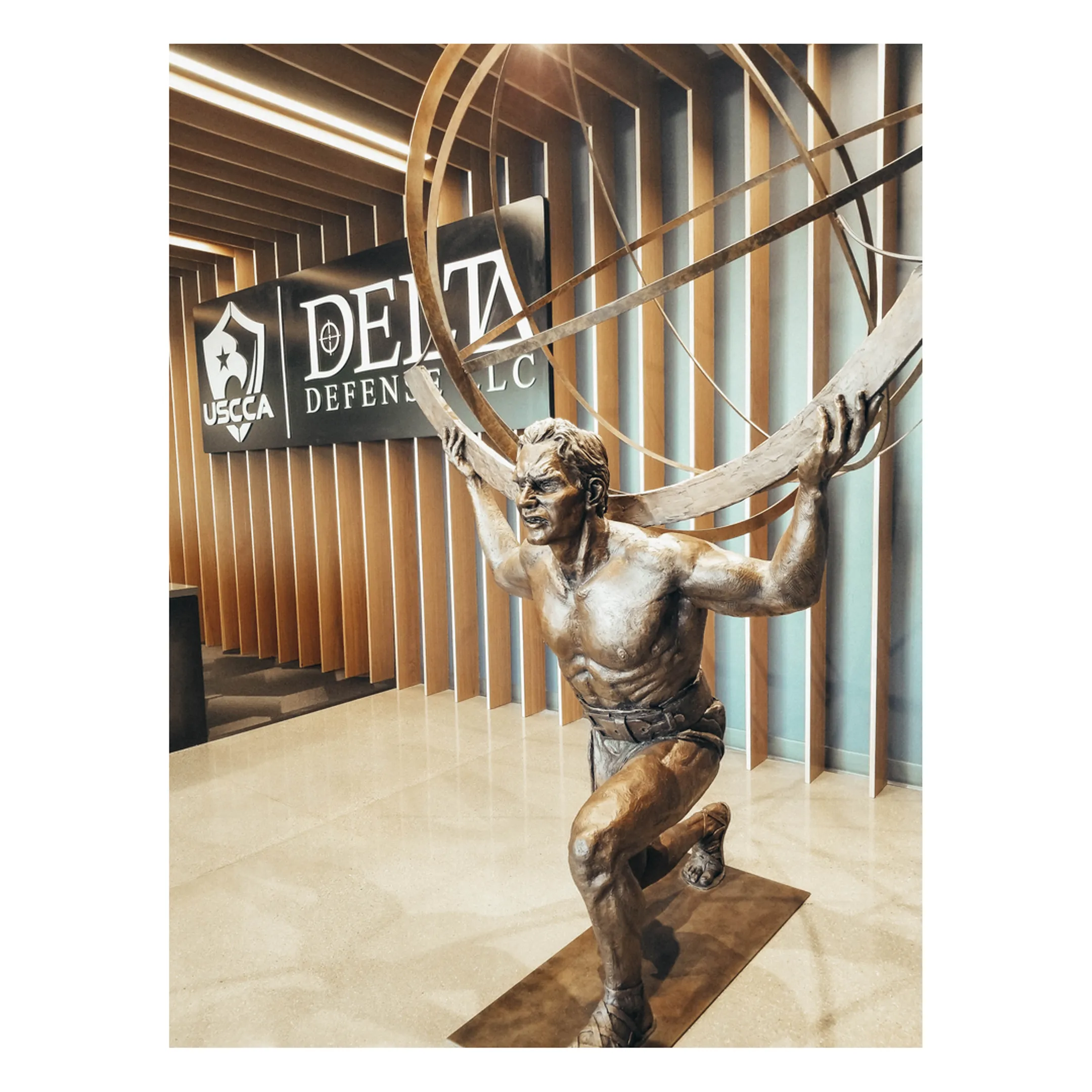 Artist refining a custom bronze sculpture