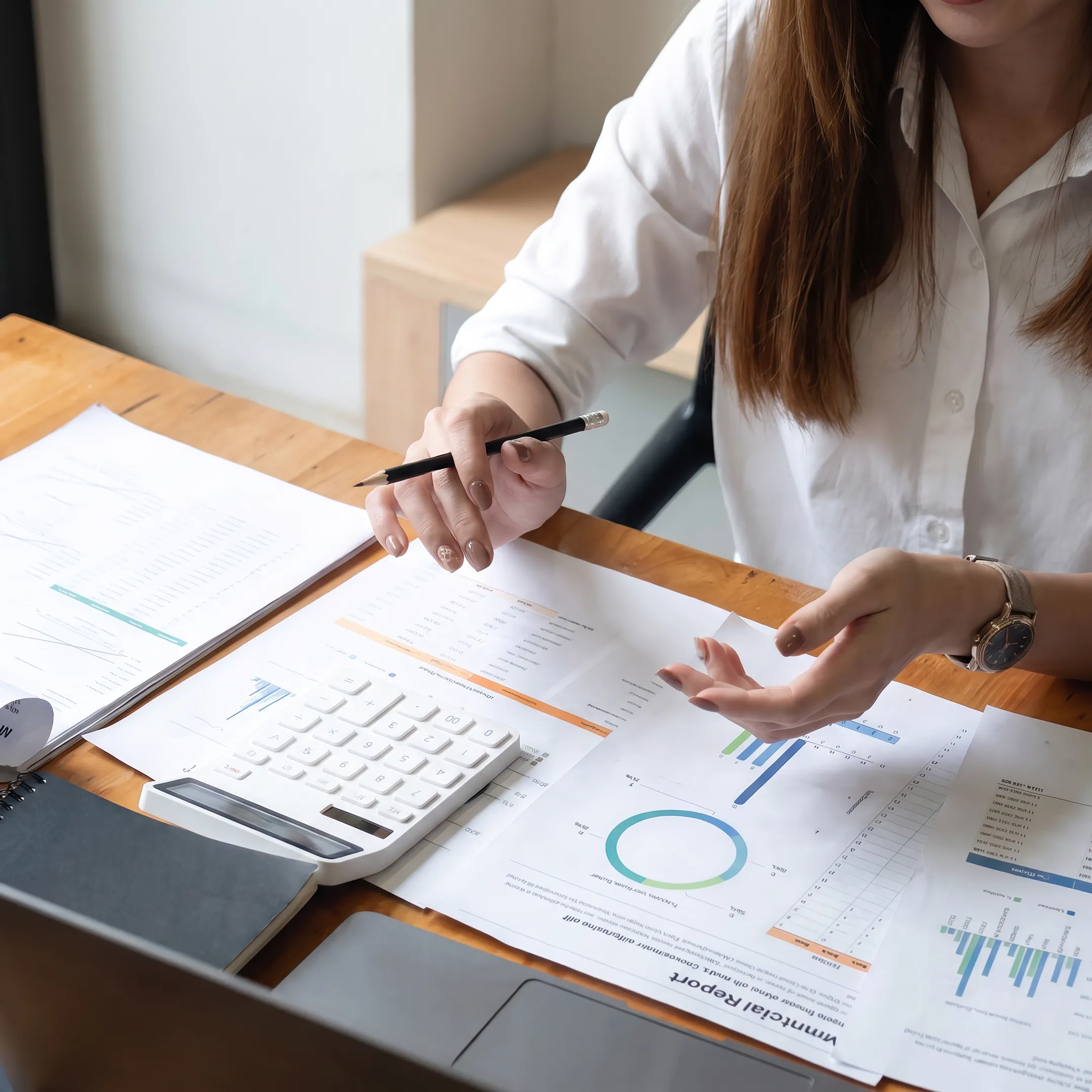 Valuation professional analyzing business records and financial data