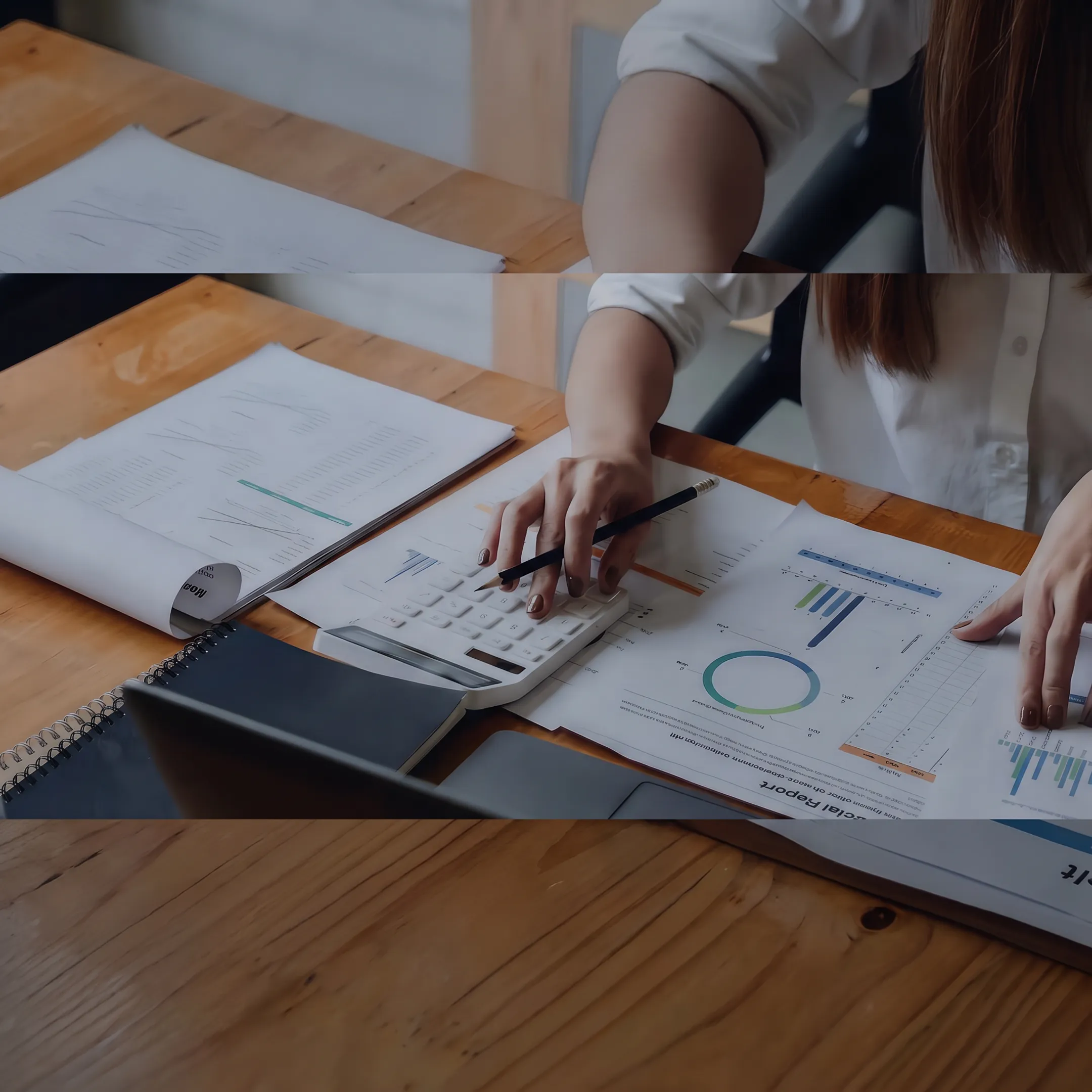 Independent business valuator reviewing financial documents at a desk