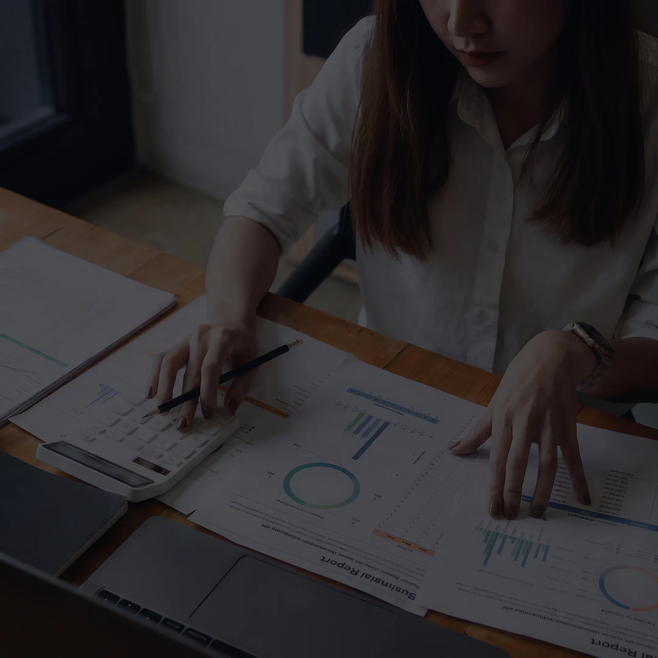 Valuation professional analyzing business financial records