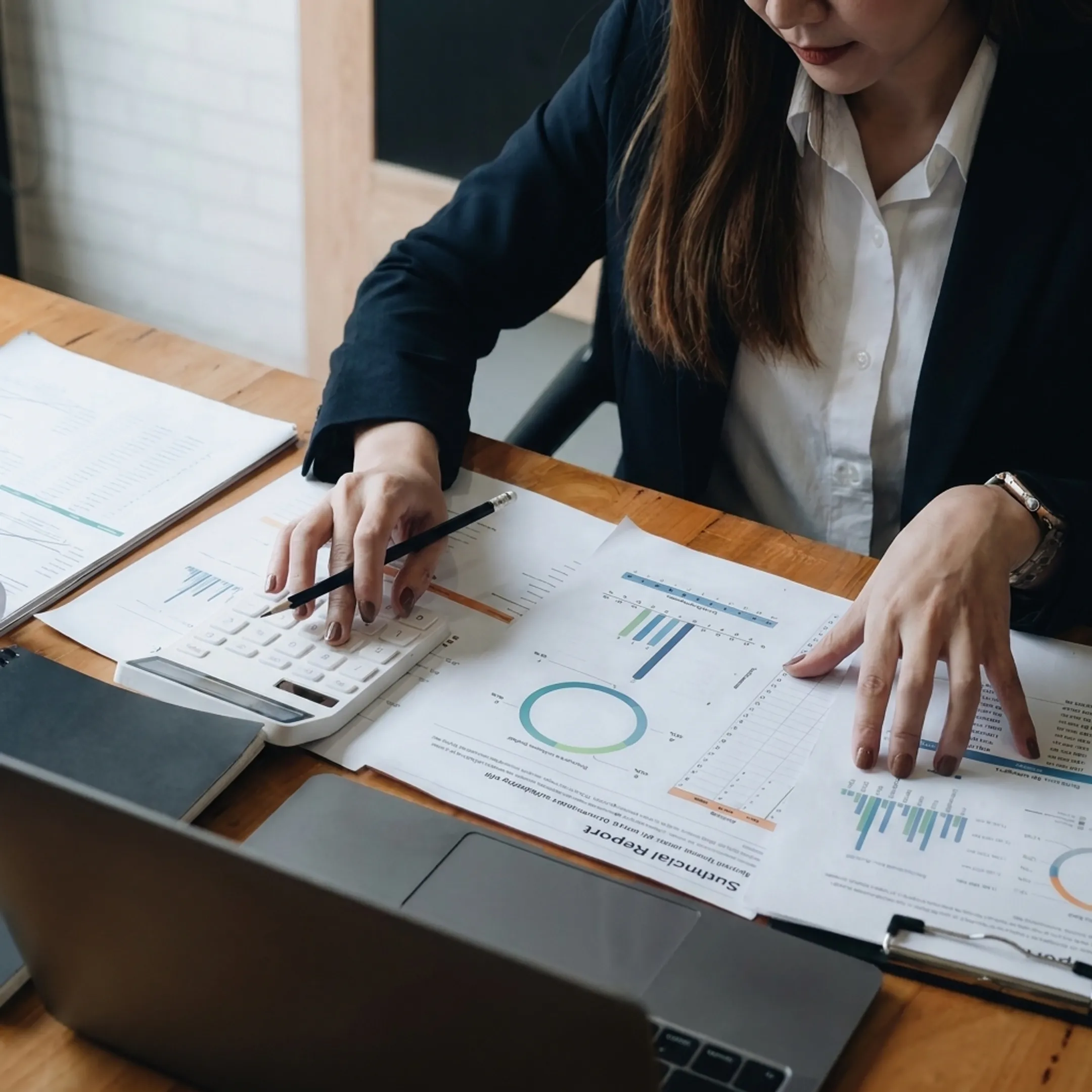 Valuation specialist analyzing business financial records