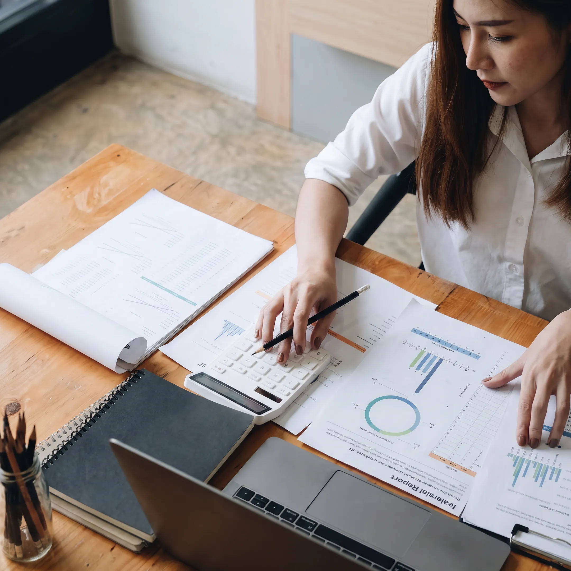 Valuation advisor analyzing car dealership business performance
