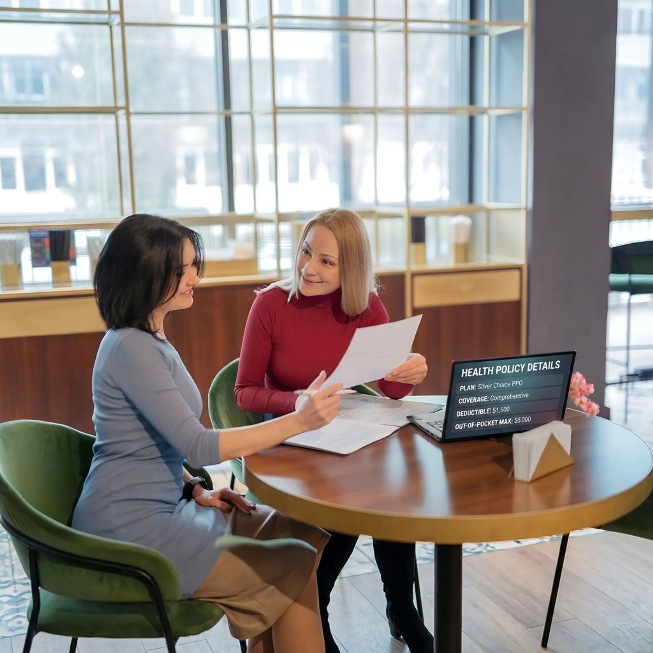Healthcare advisor discussing small business medical plan designs with a client