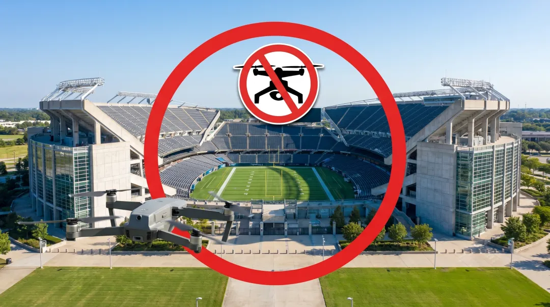 FAA drone restricted airspace warning sign near large sports stadium venue